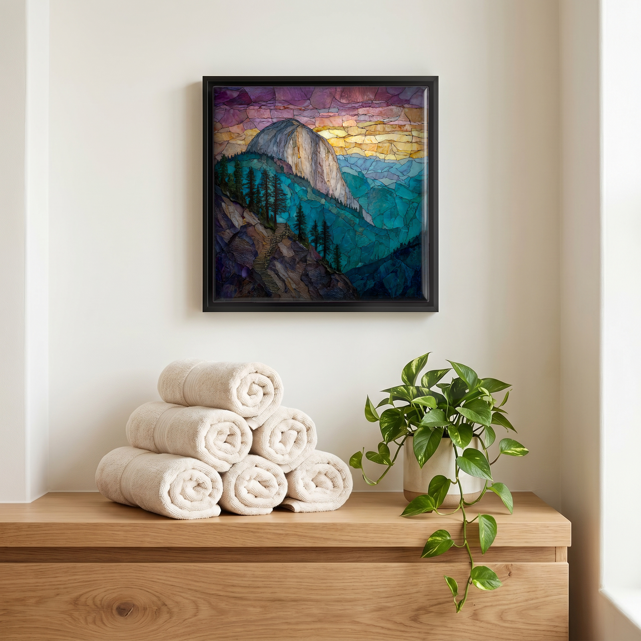 Above the linens, in a slim black surround.