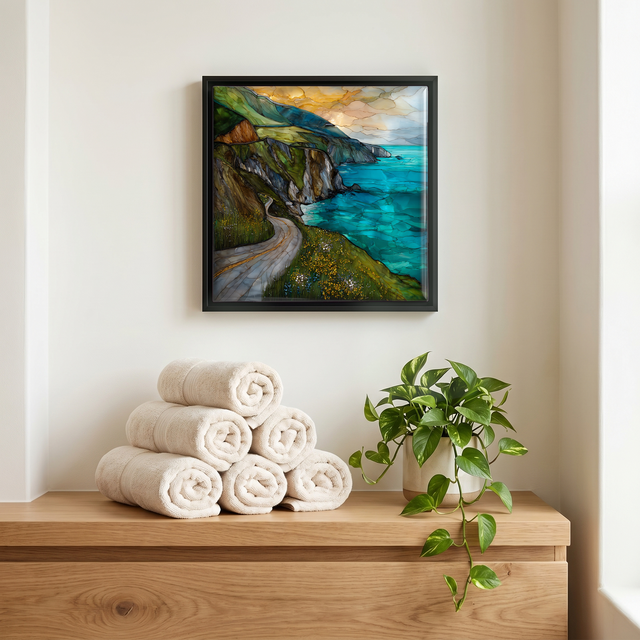 Above the linens, in a slim black surround.