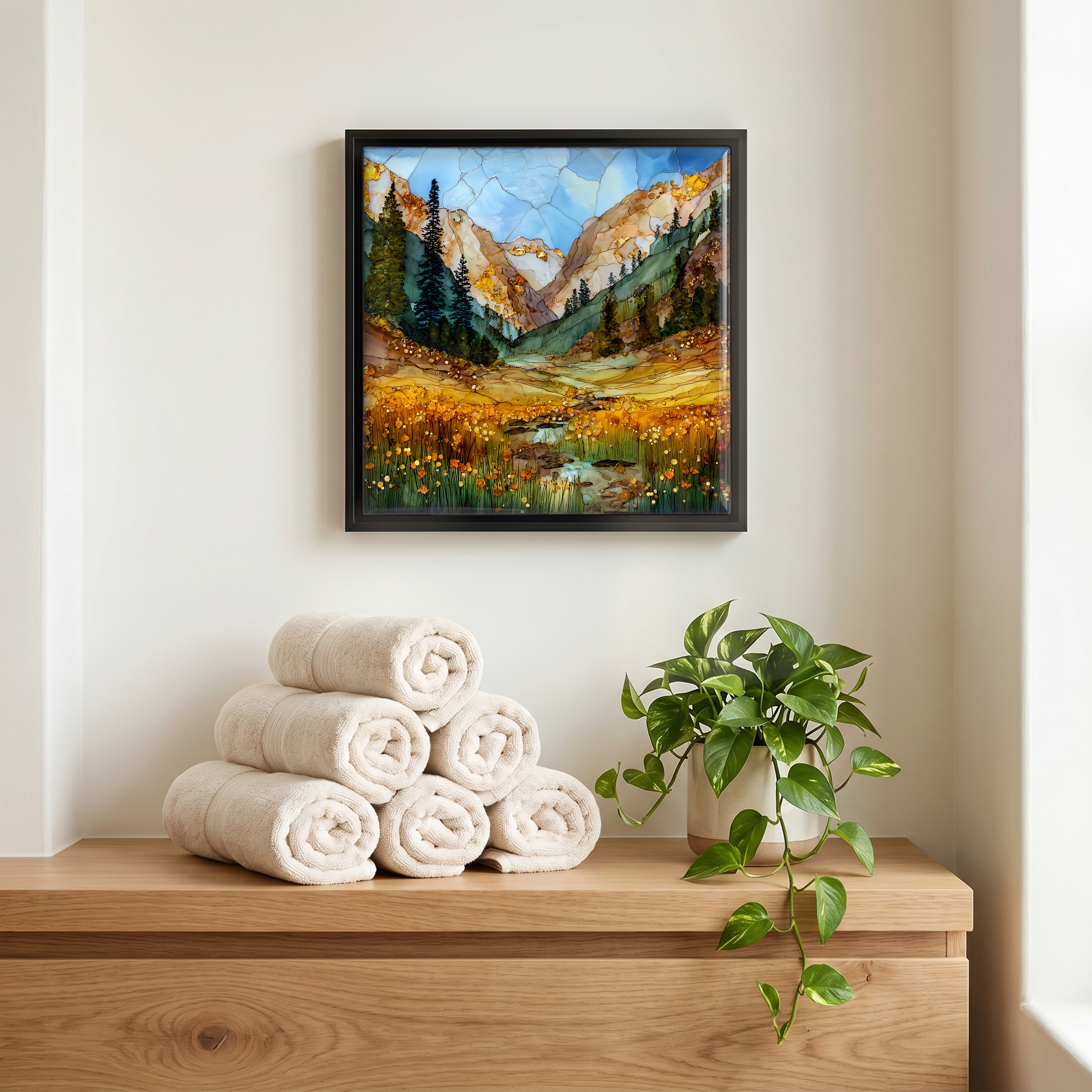 Above the linens, in a slim black surround.