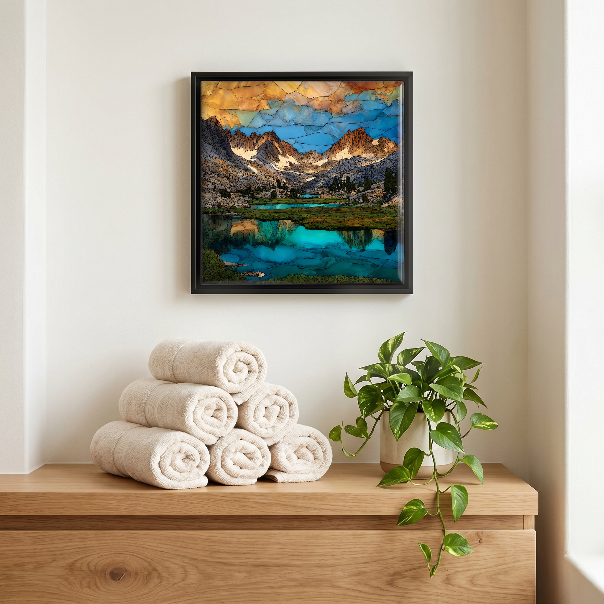 Above the linens, in a slim black surround.