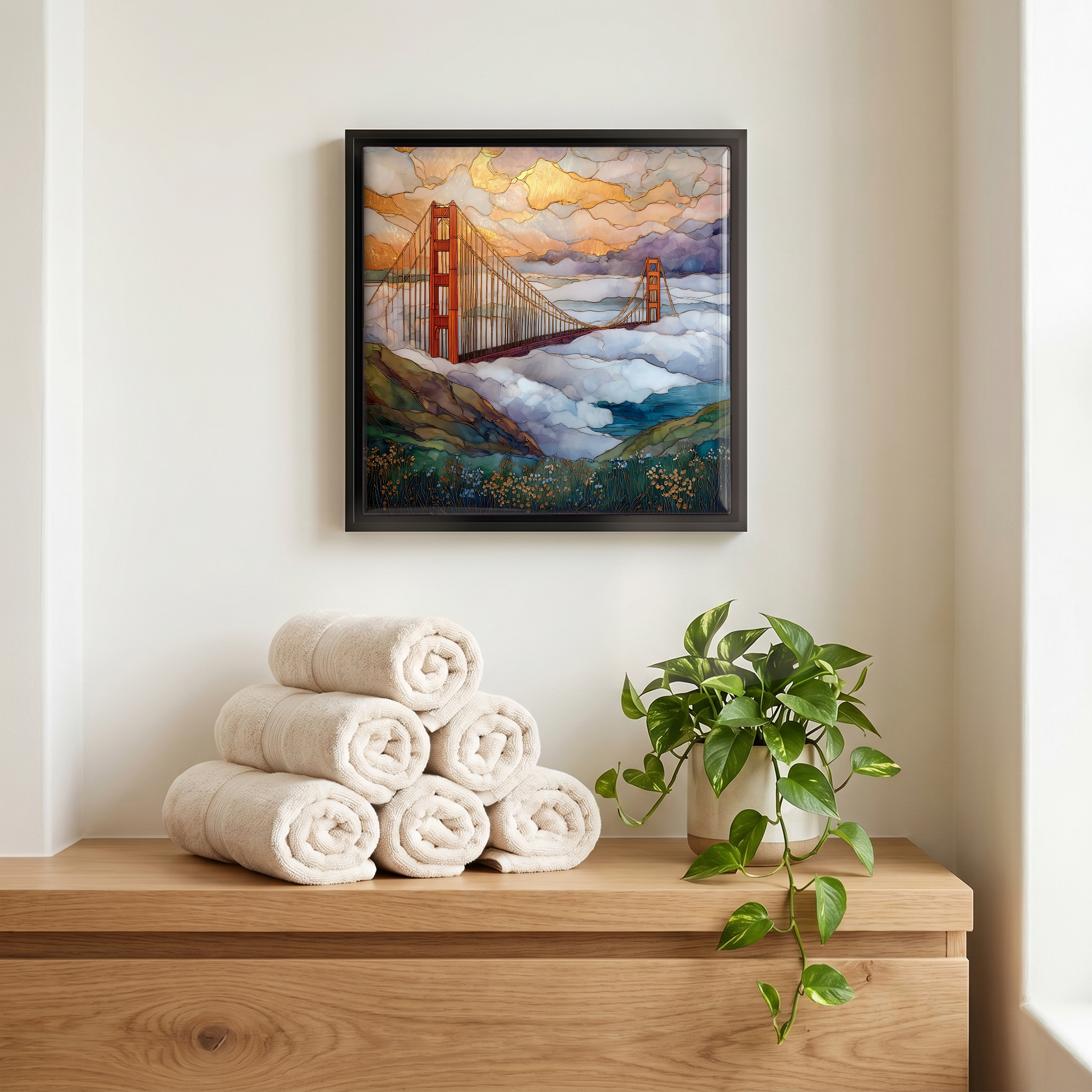 Above the linens, in a slim black surround.