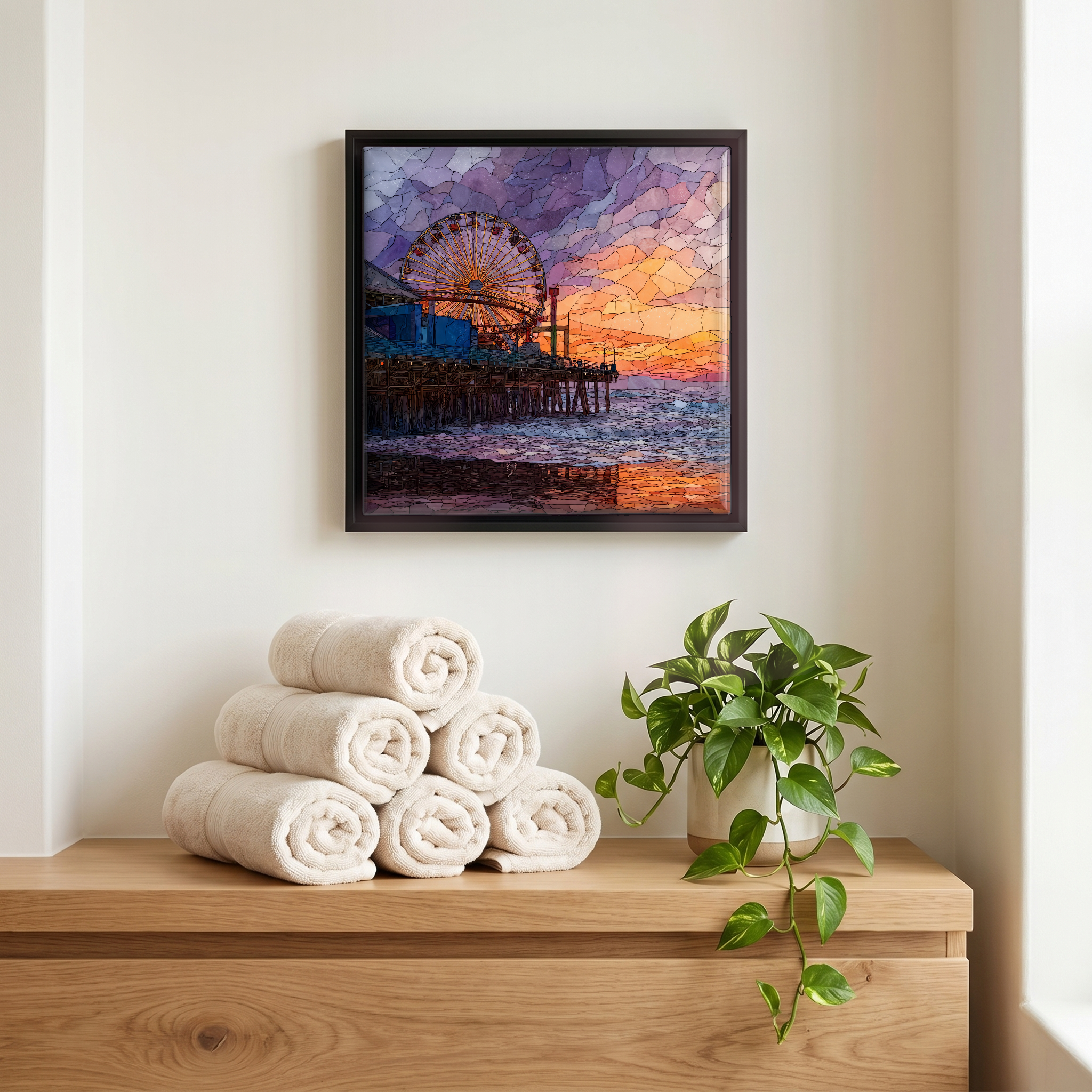 Above the linens, in a slim black surround.