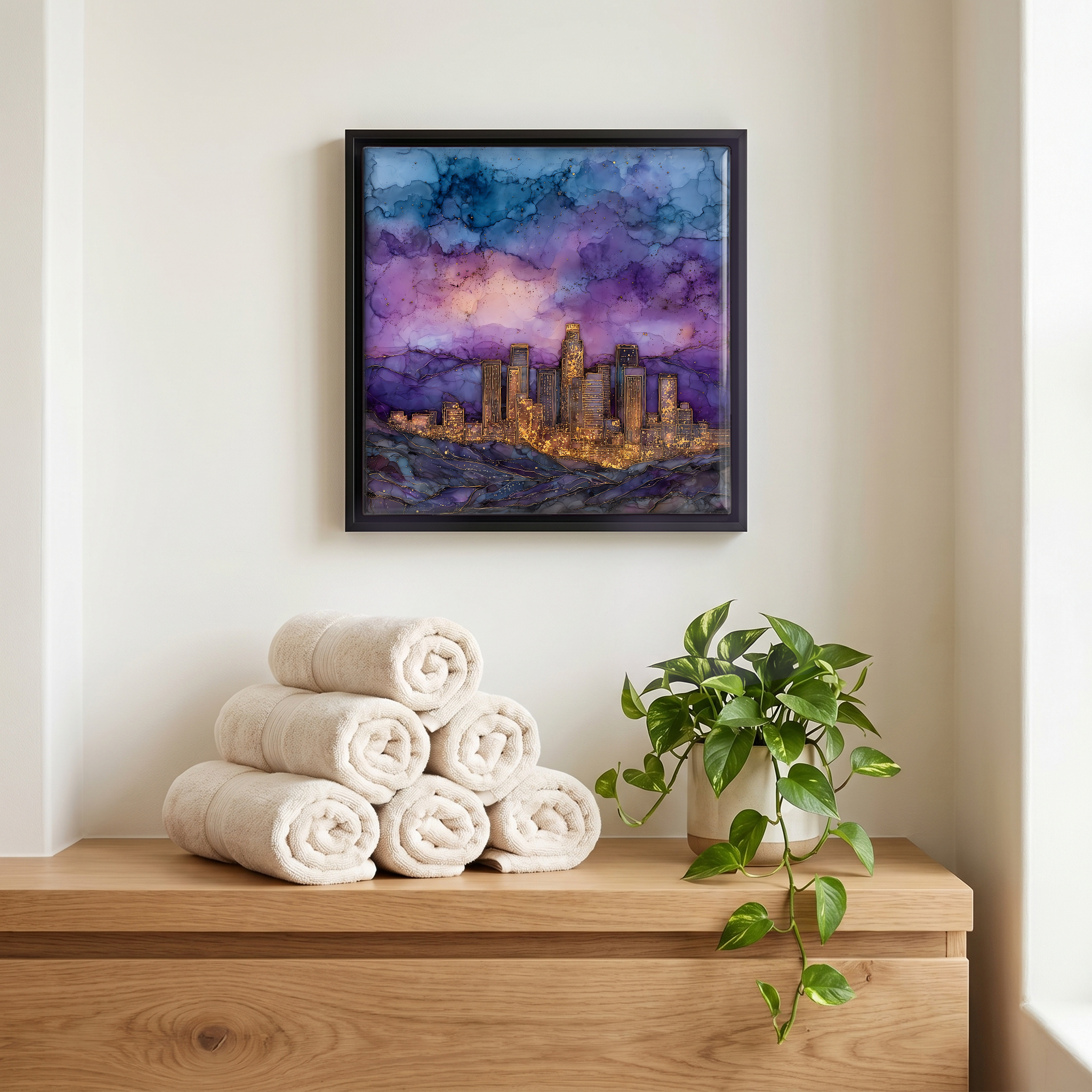 Above the linens, in a slim black surround.