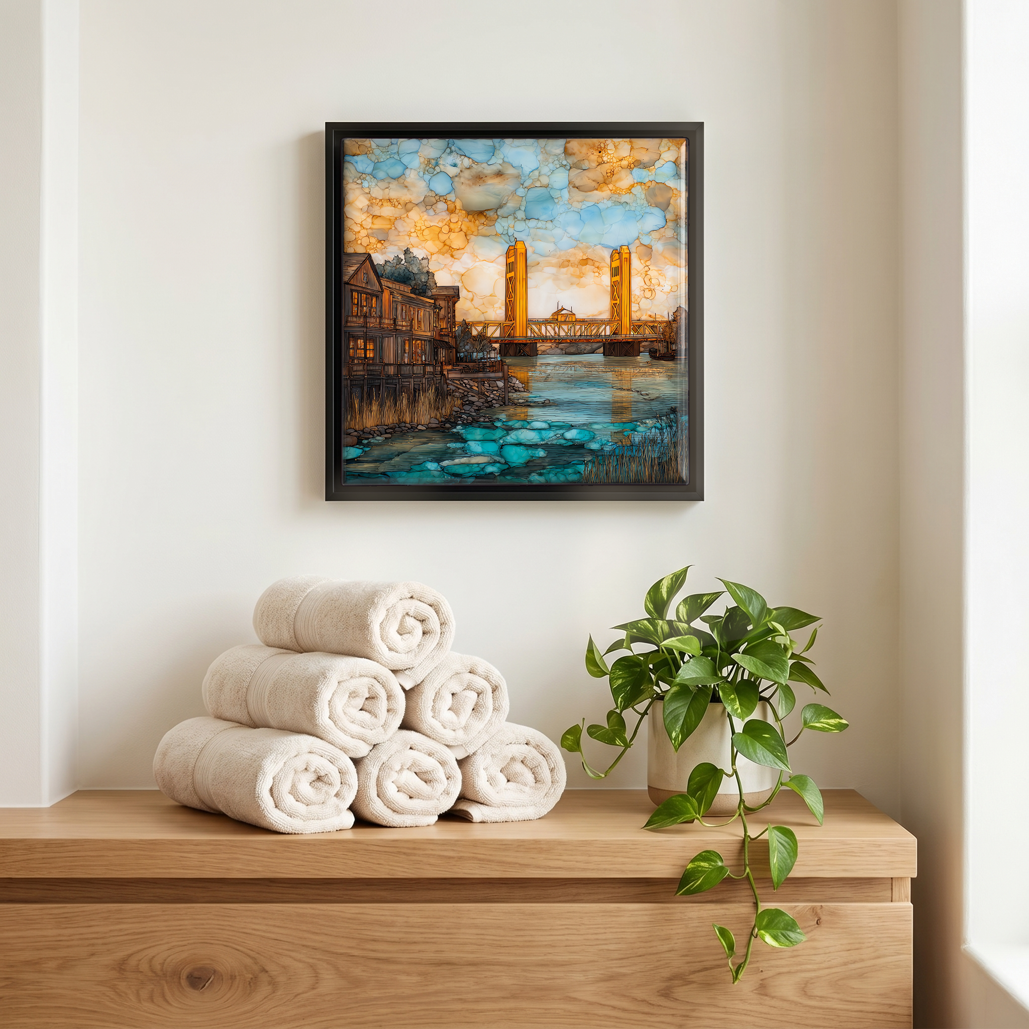 Above the linens, in a slim black surround.