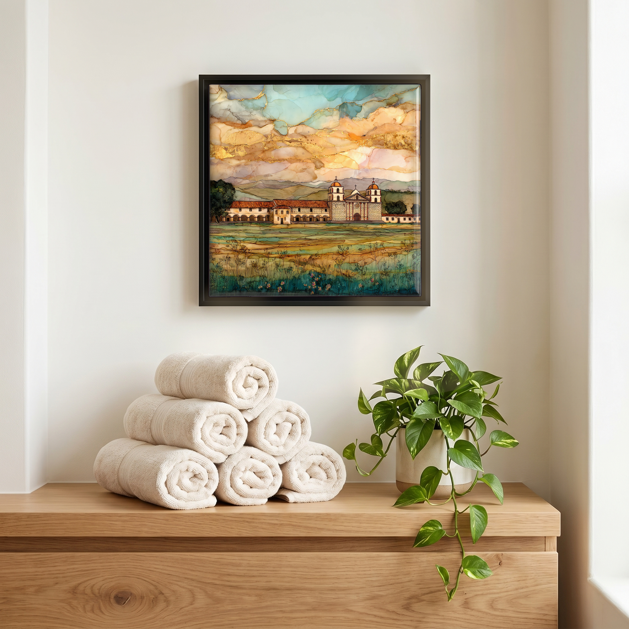 Above the linens, in a slim black surround.