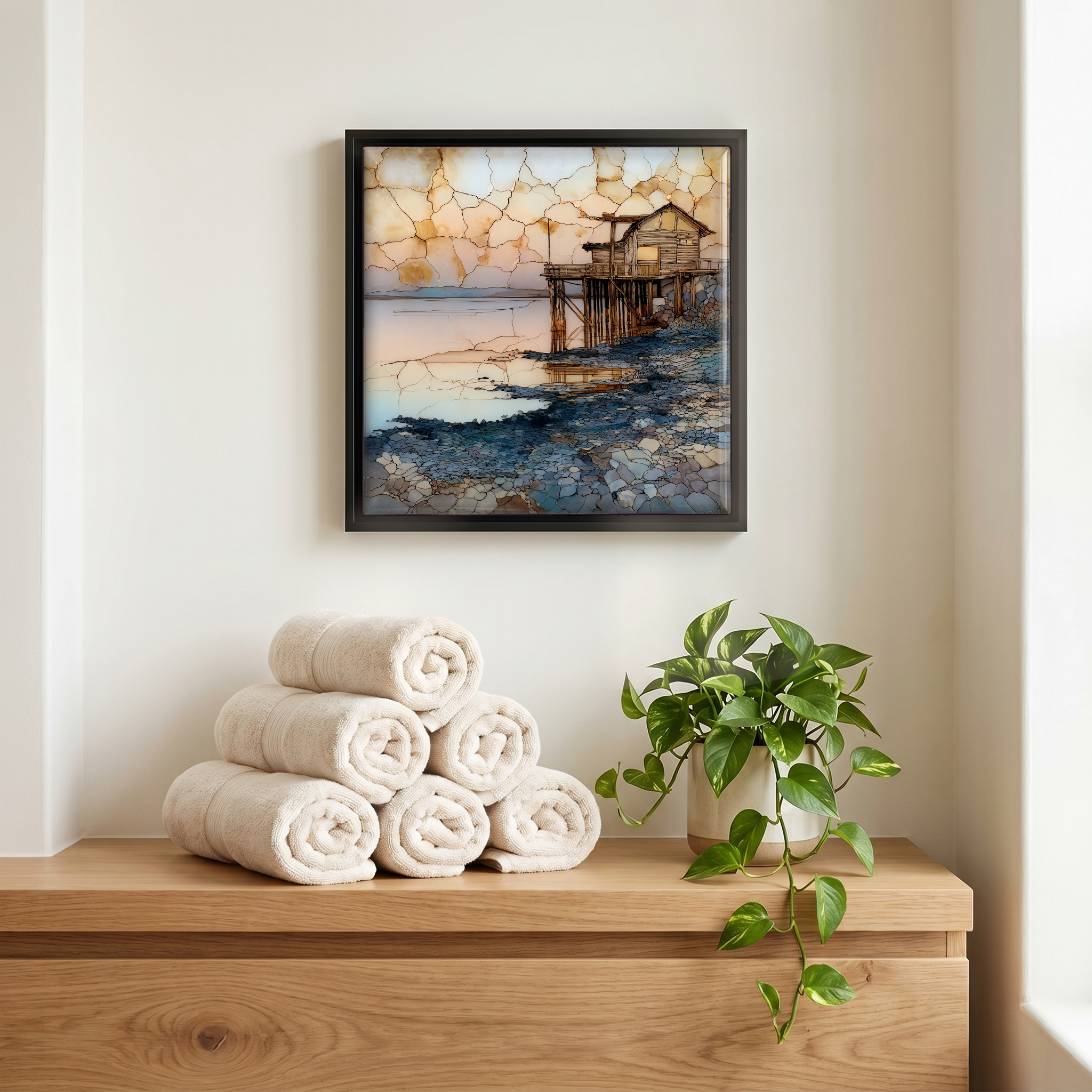 Above the linens, in a slim black surround.