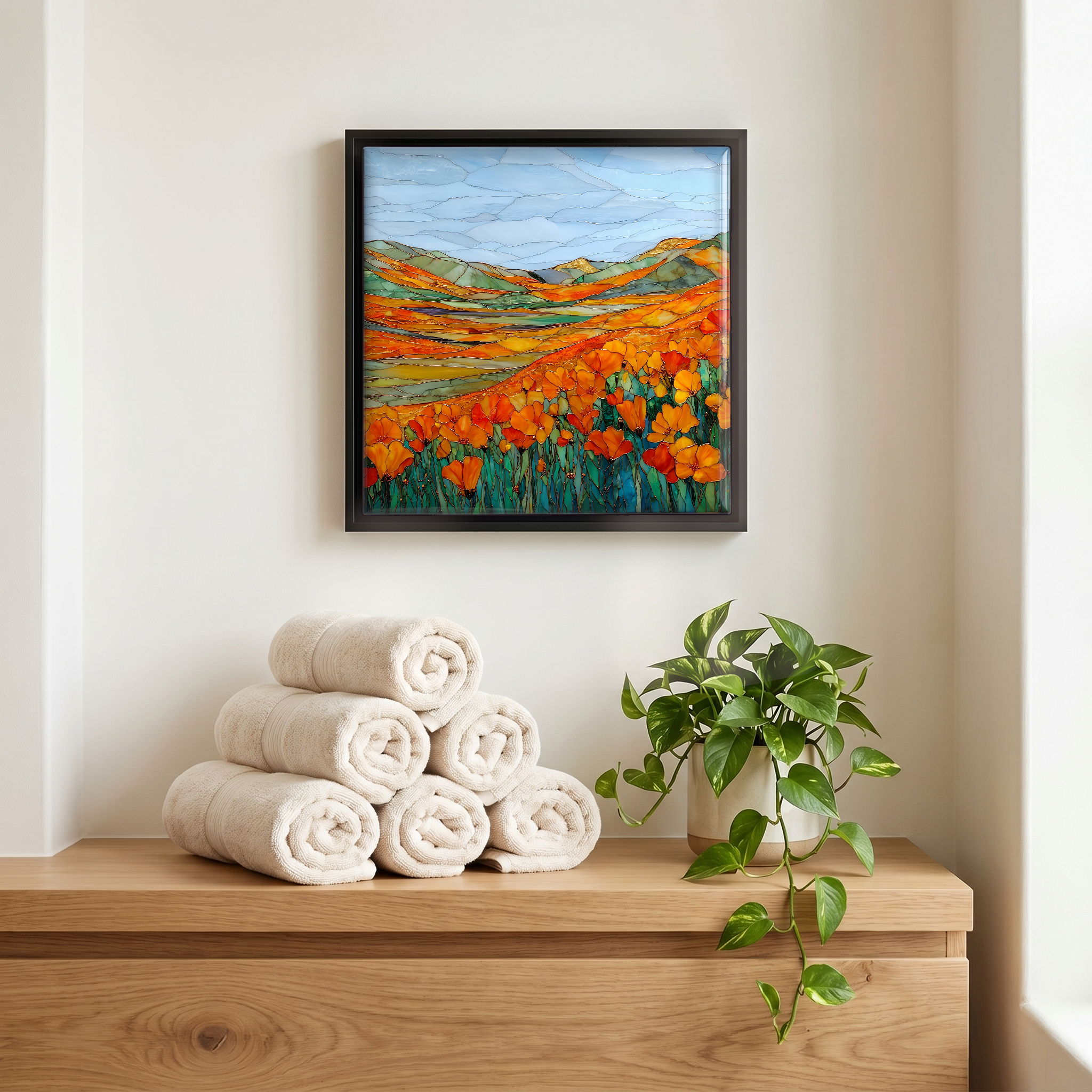 Above the linens, in a slim black surround.