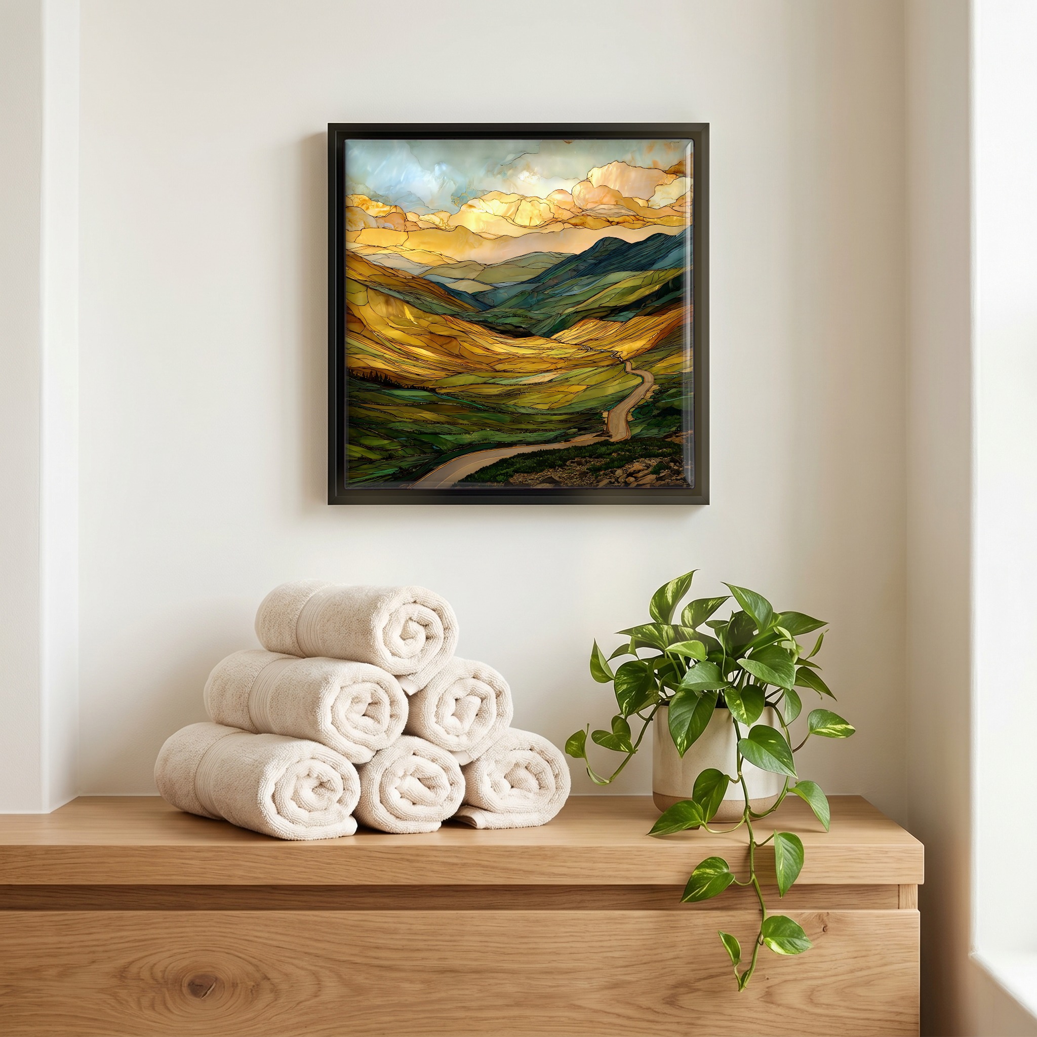 Above the linens, in a slim black surround.