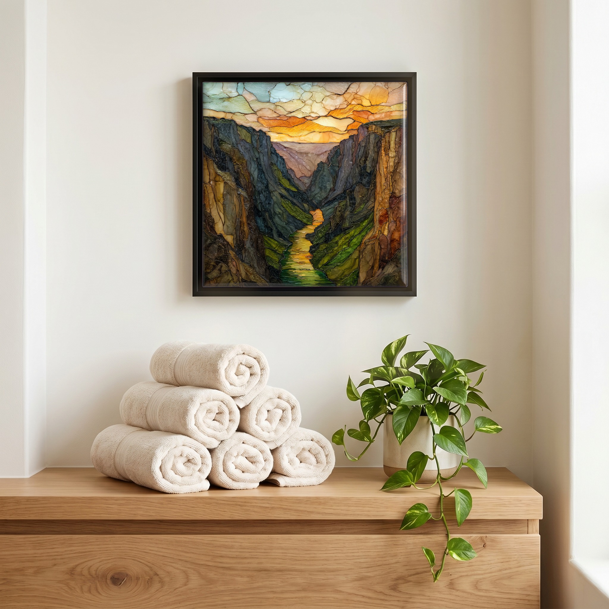 Above the linens, in a slim black surround.