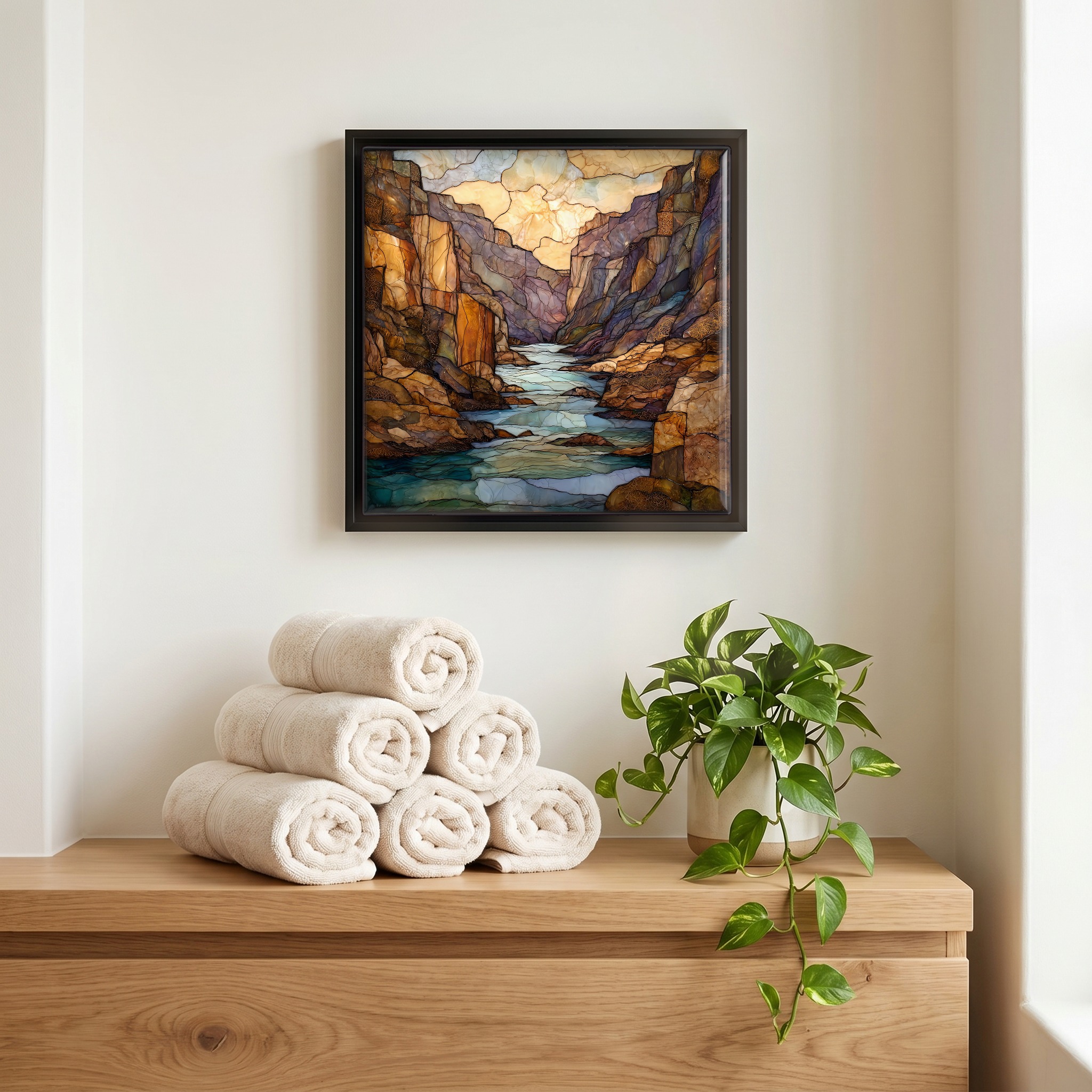 Above the linens, in a slim black surround.