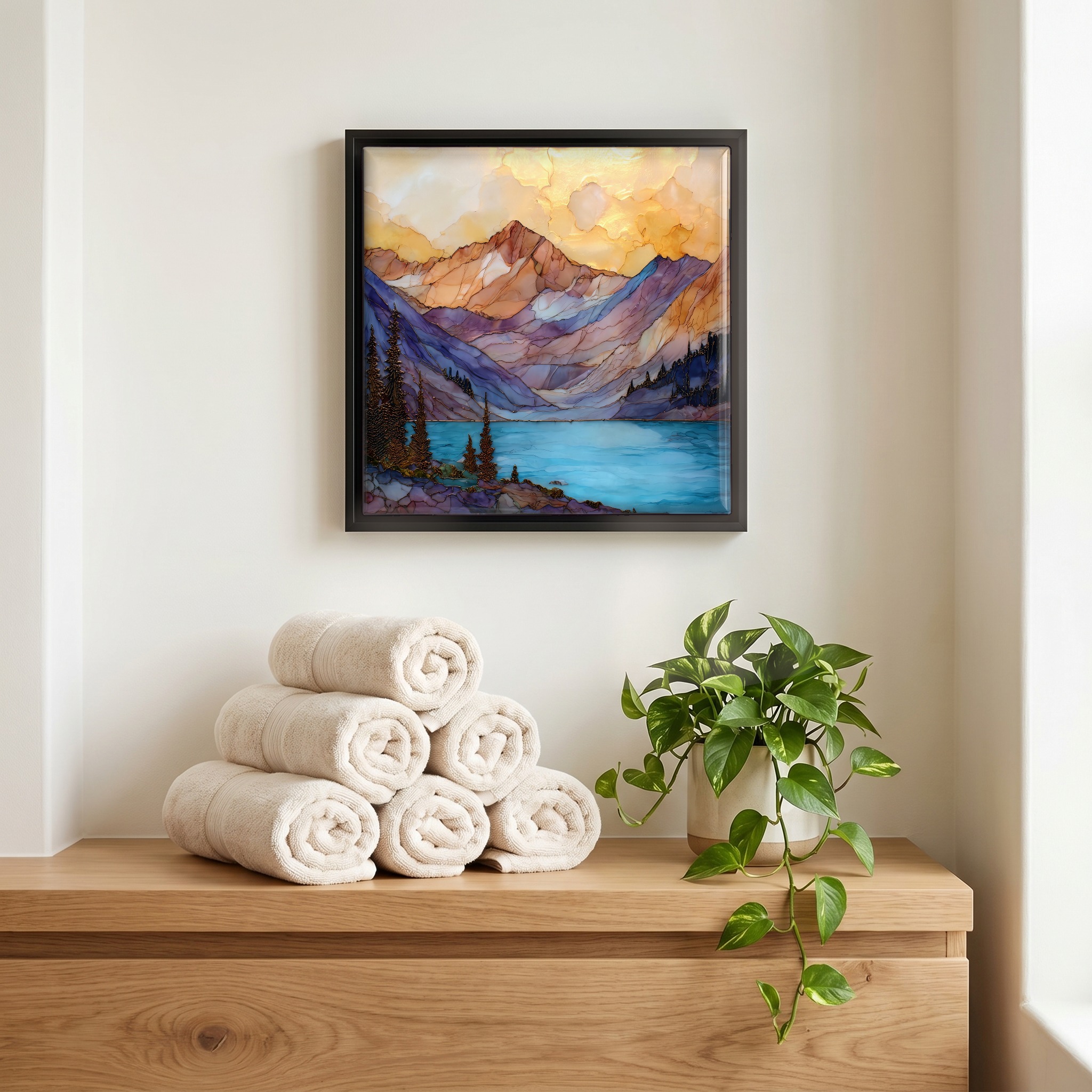 Above the linens, in a slim black surround.