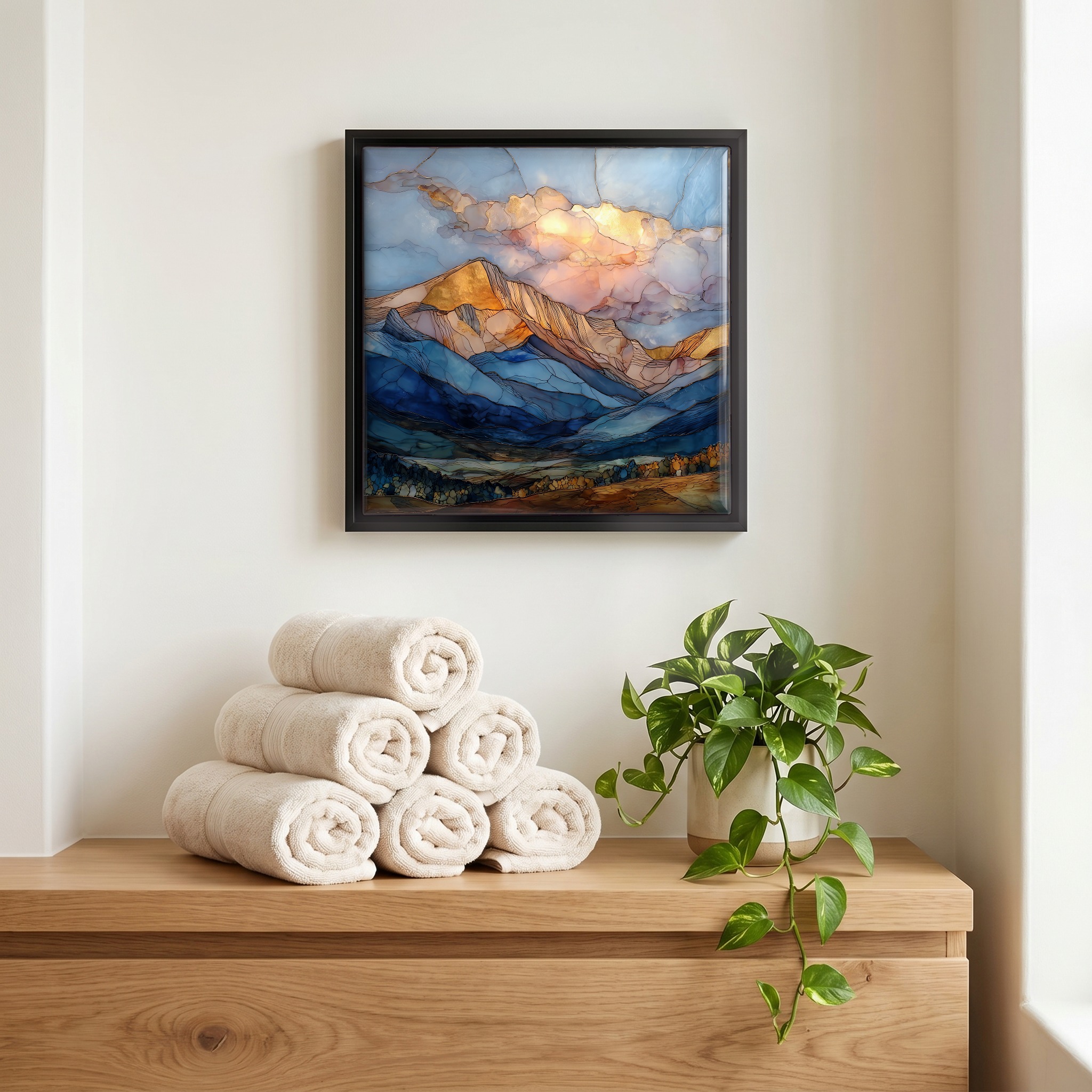 Above the linens, in a slim black surround.
