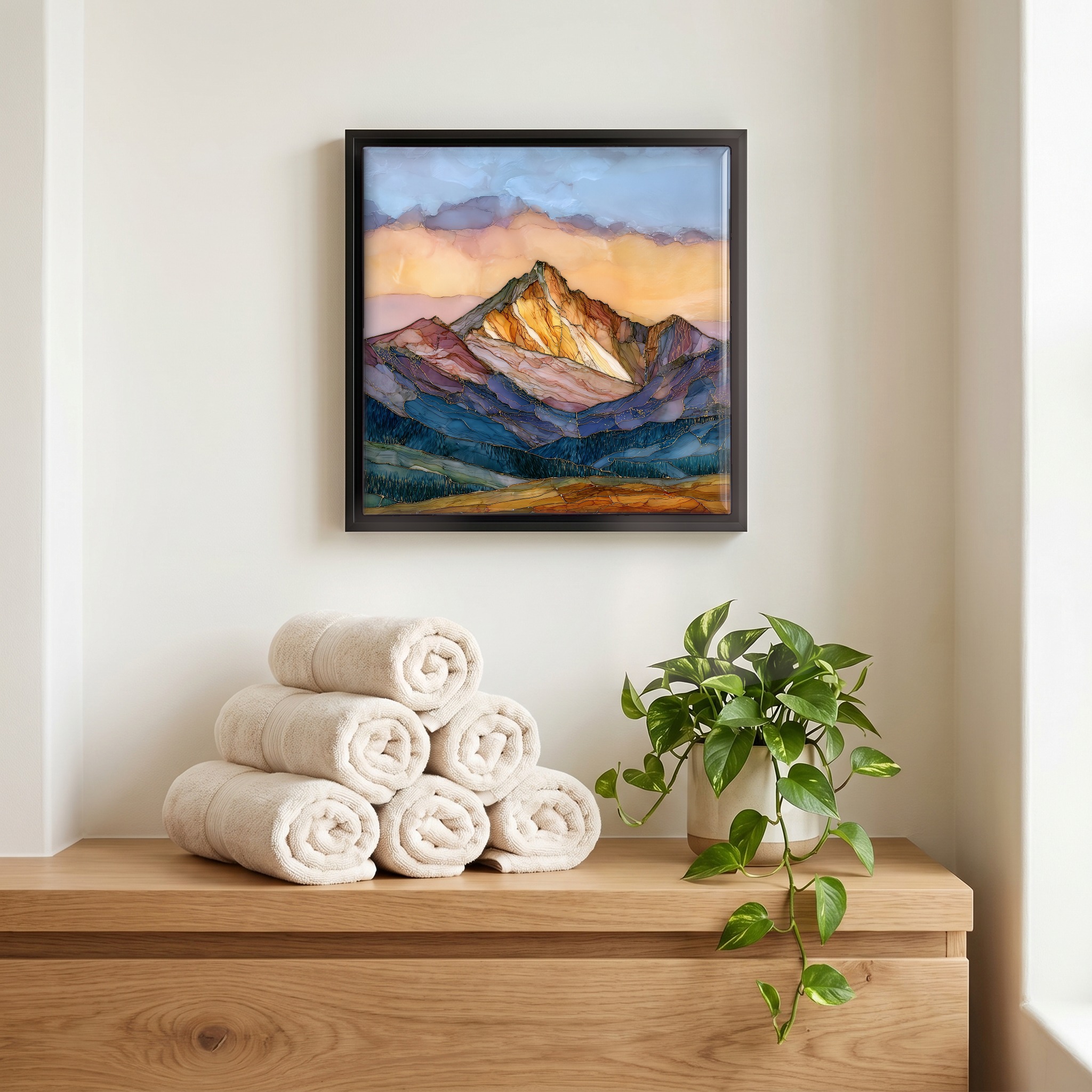 Above the linens, in a slim black surround.