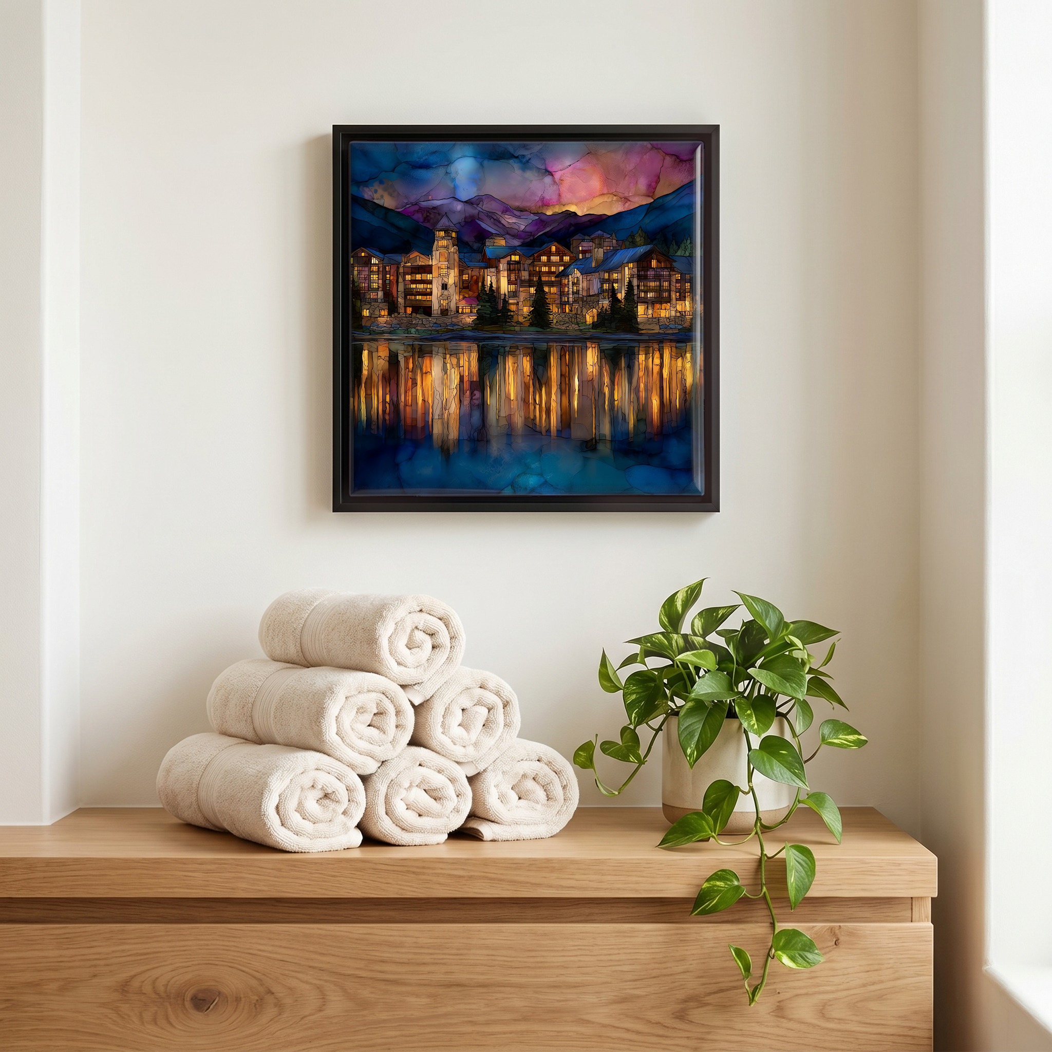 Above the linens, in a slim black surround.