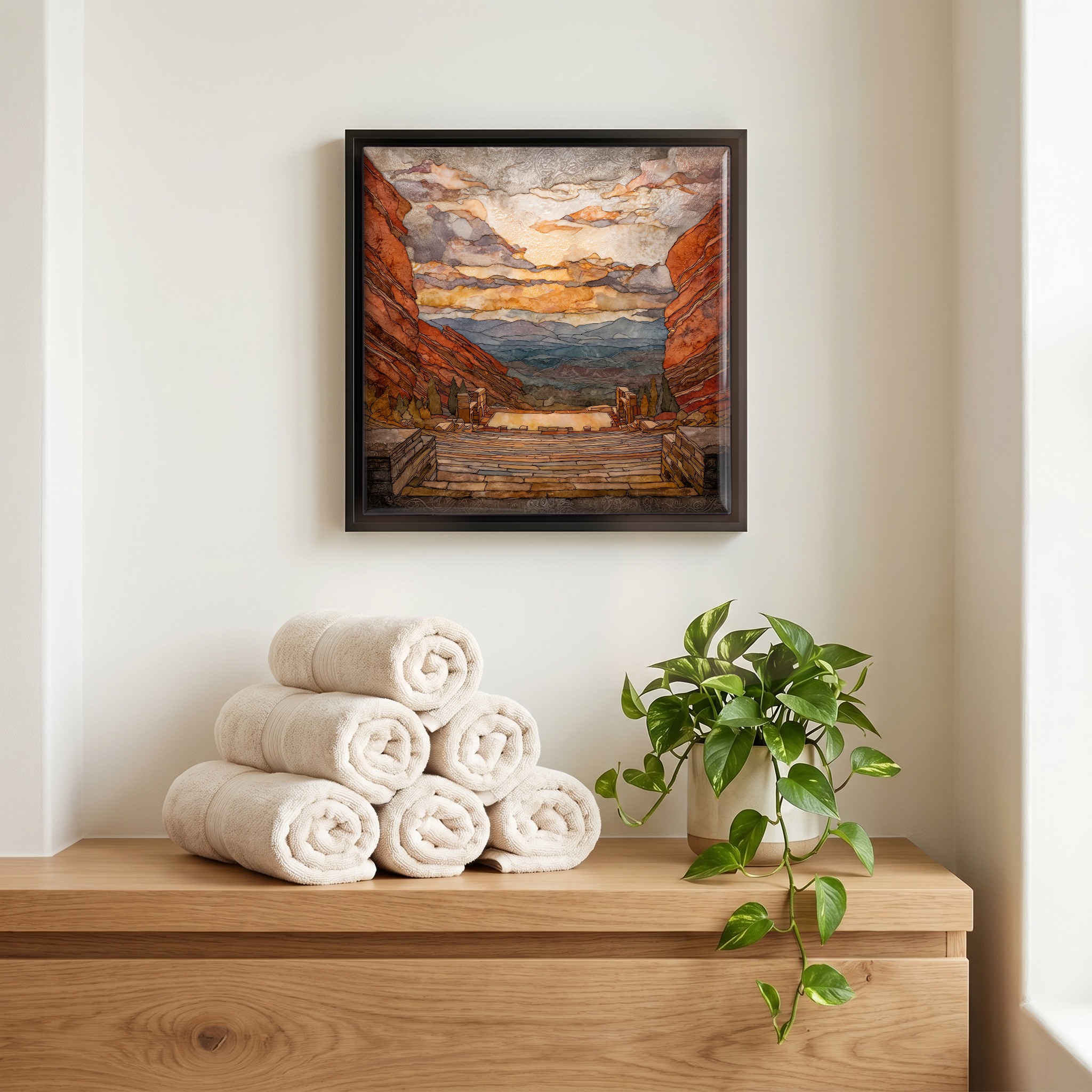 Above the linens, in a slim black surround.