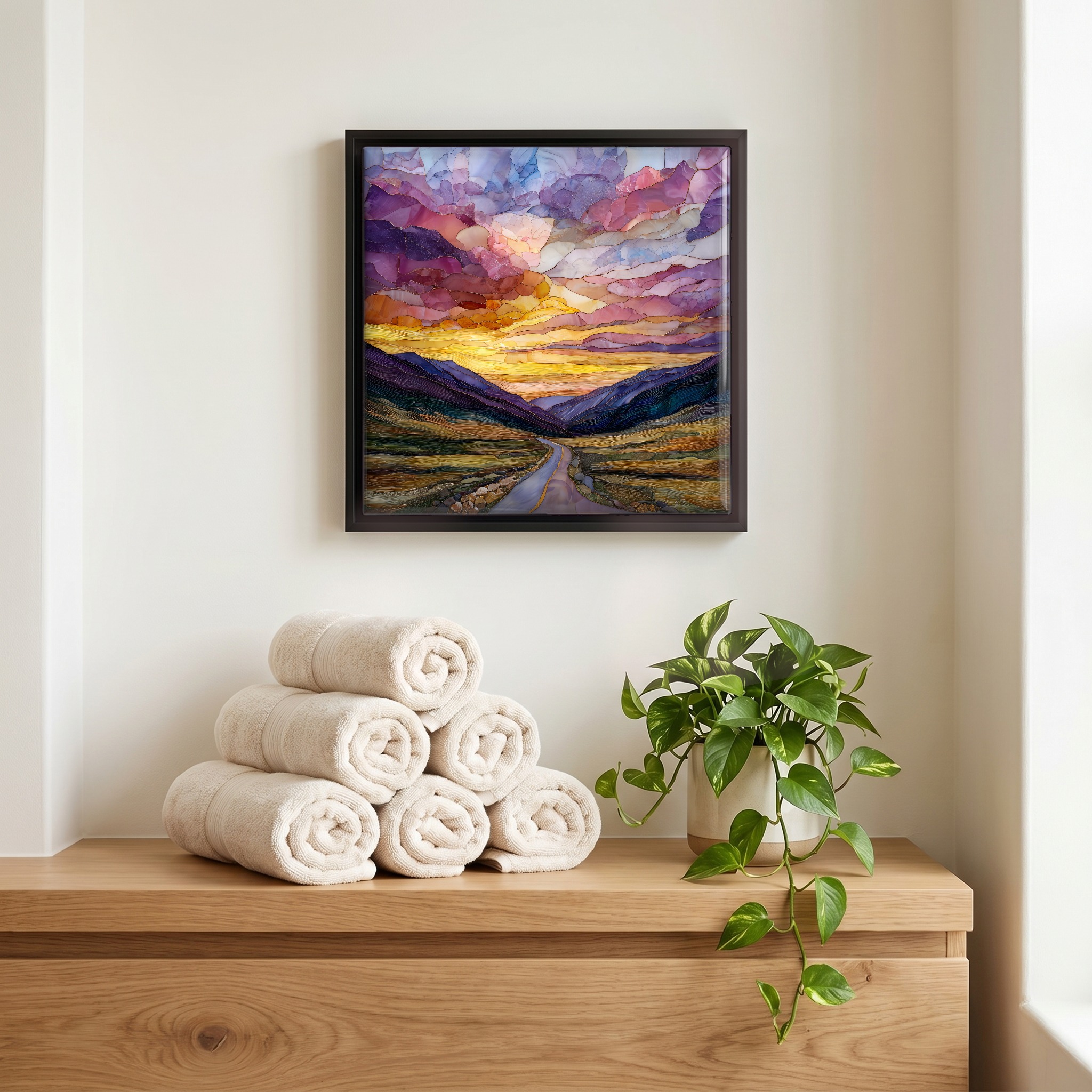 Above the linens, in a slim black surround.