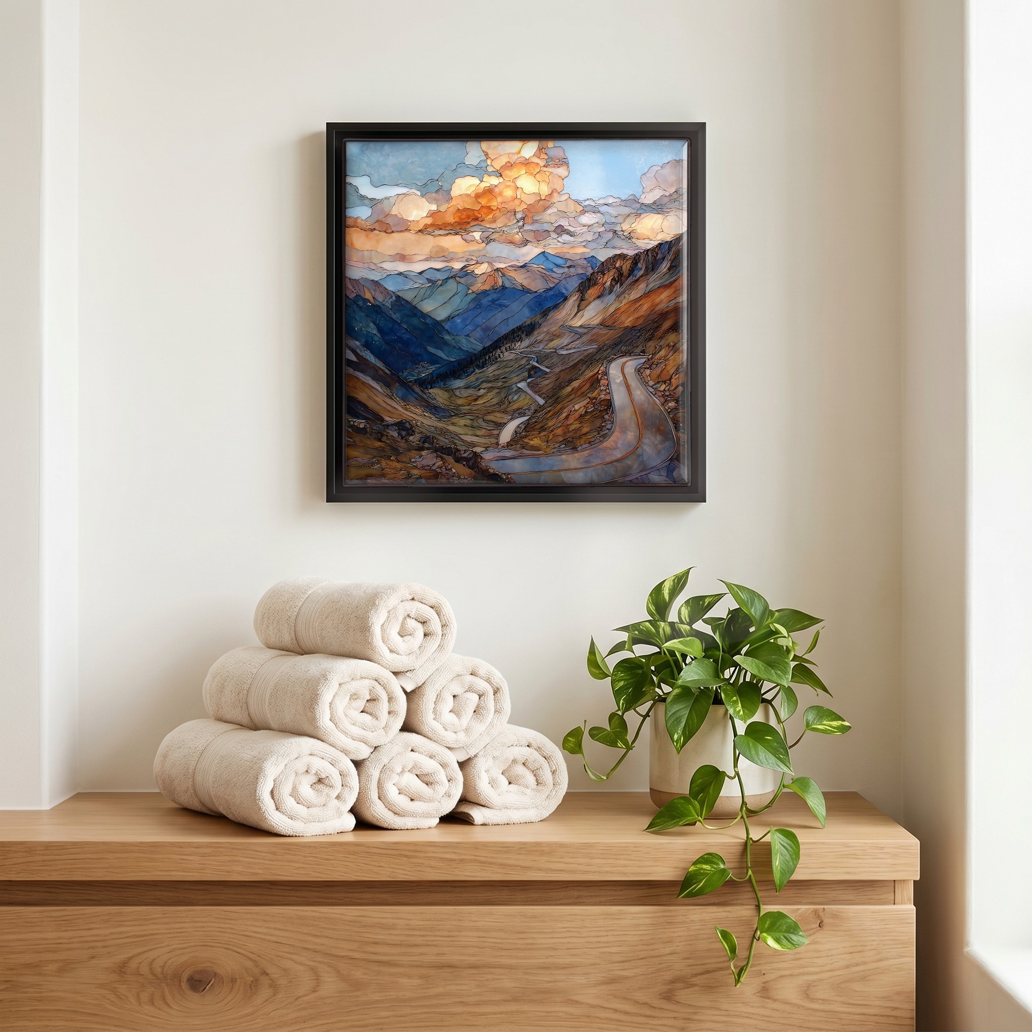 Above the linens, in a slim black surround.