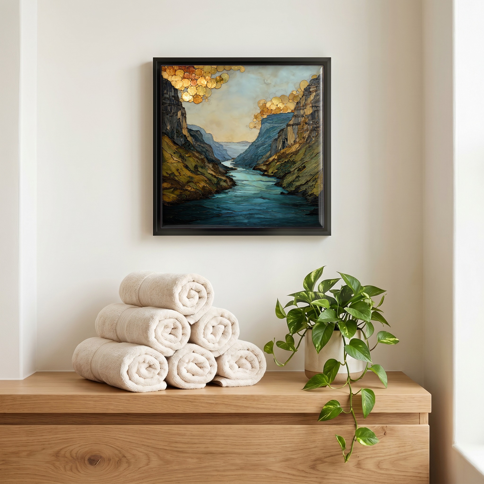 Above the linens, in a slim black surround.