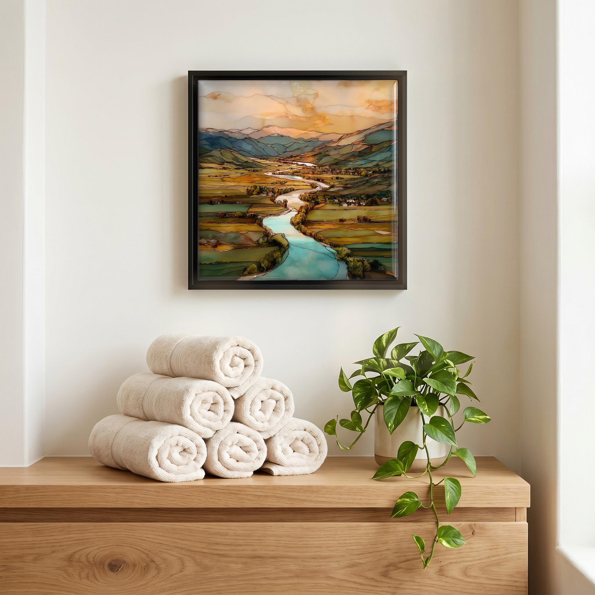 Above the linens, in a slim black surround.
