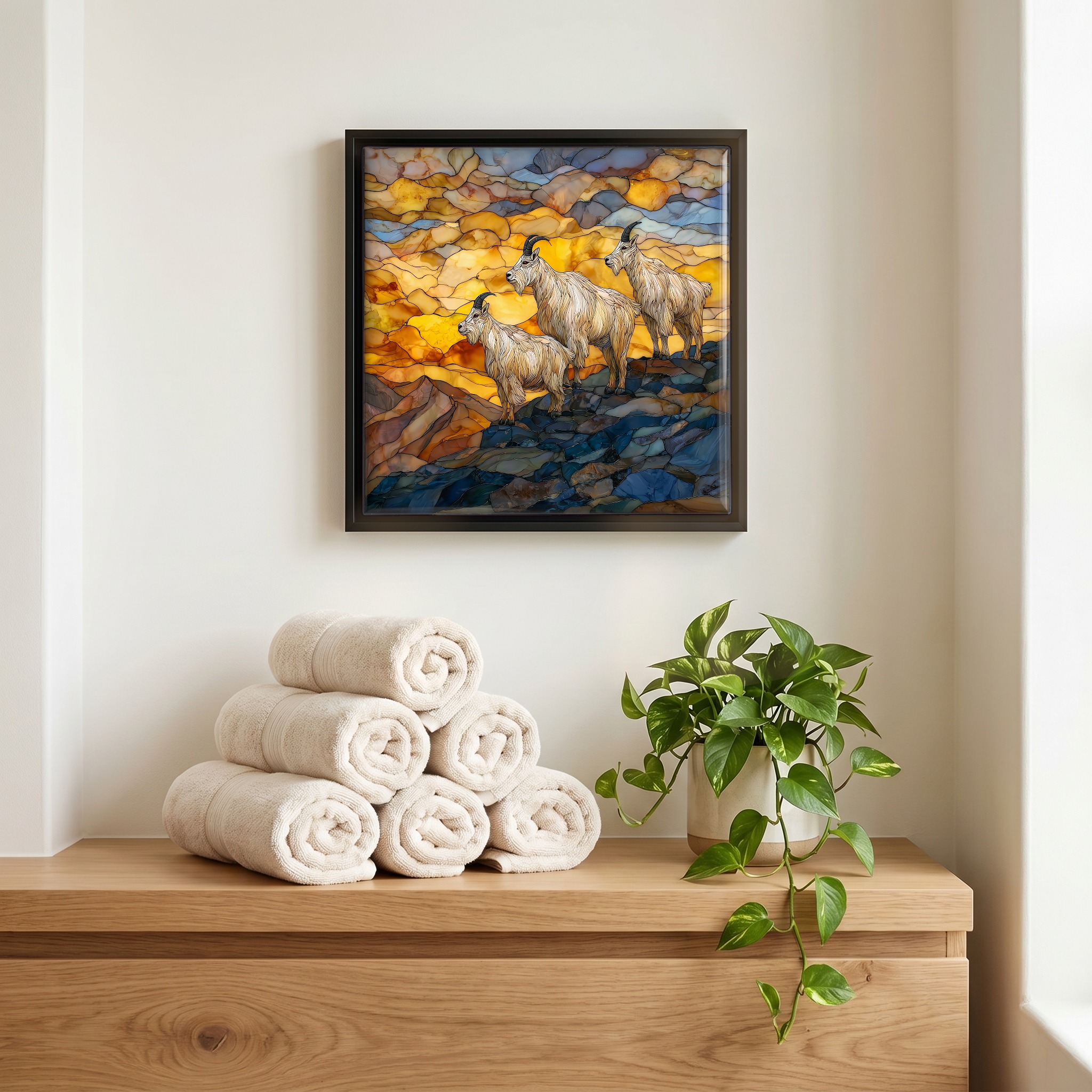 Above the linens, in a slim black surround.