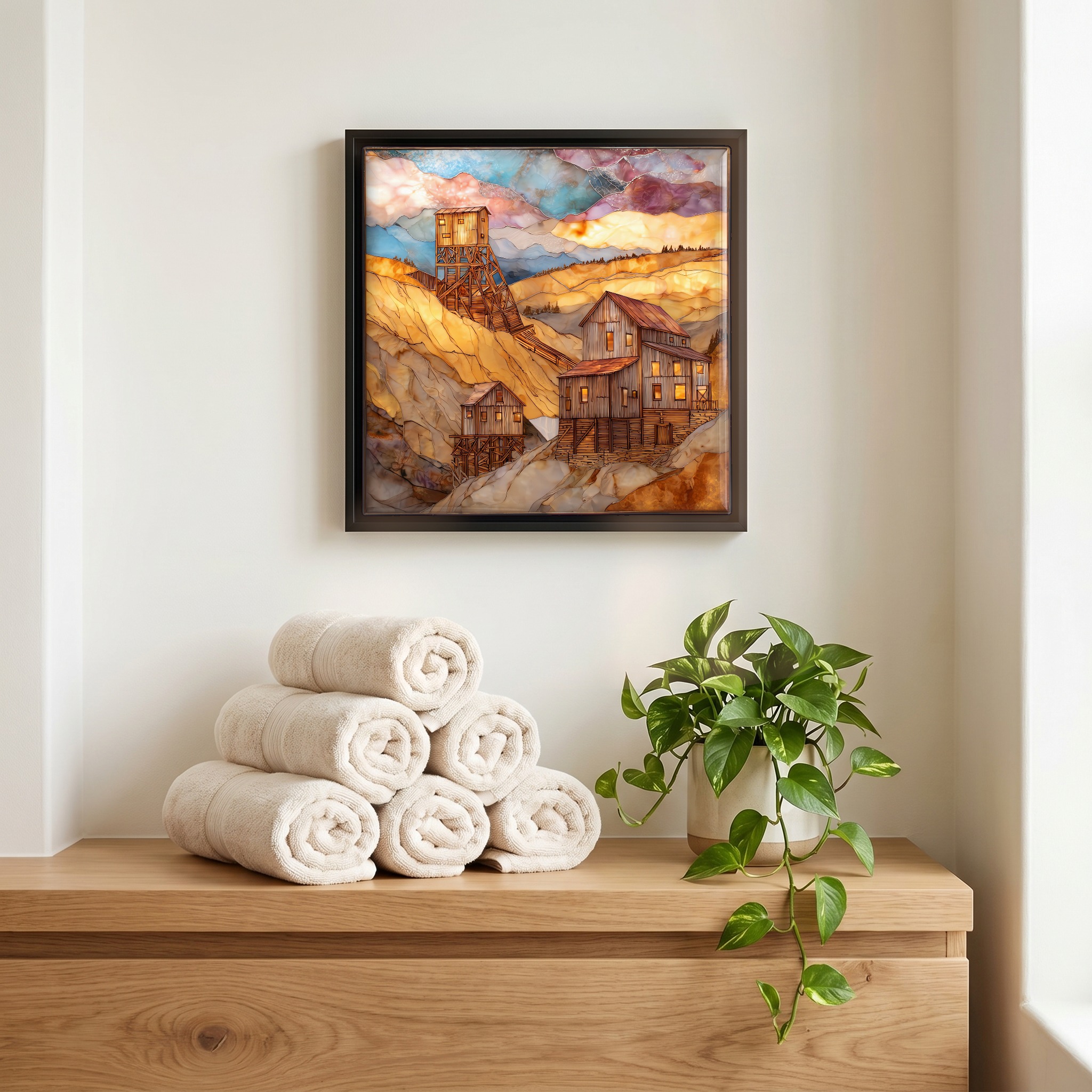 Above the linens, in a slim black surround.