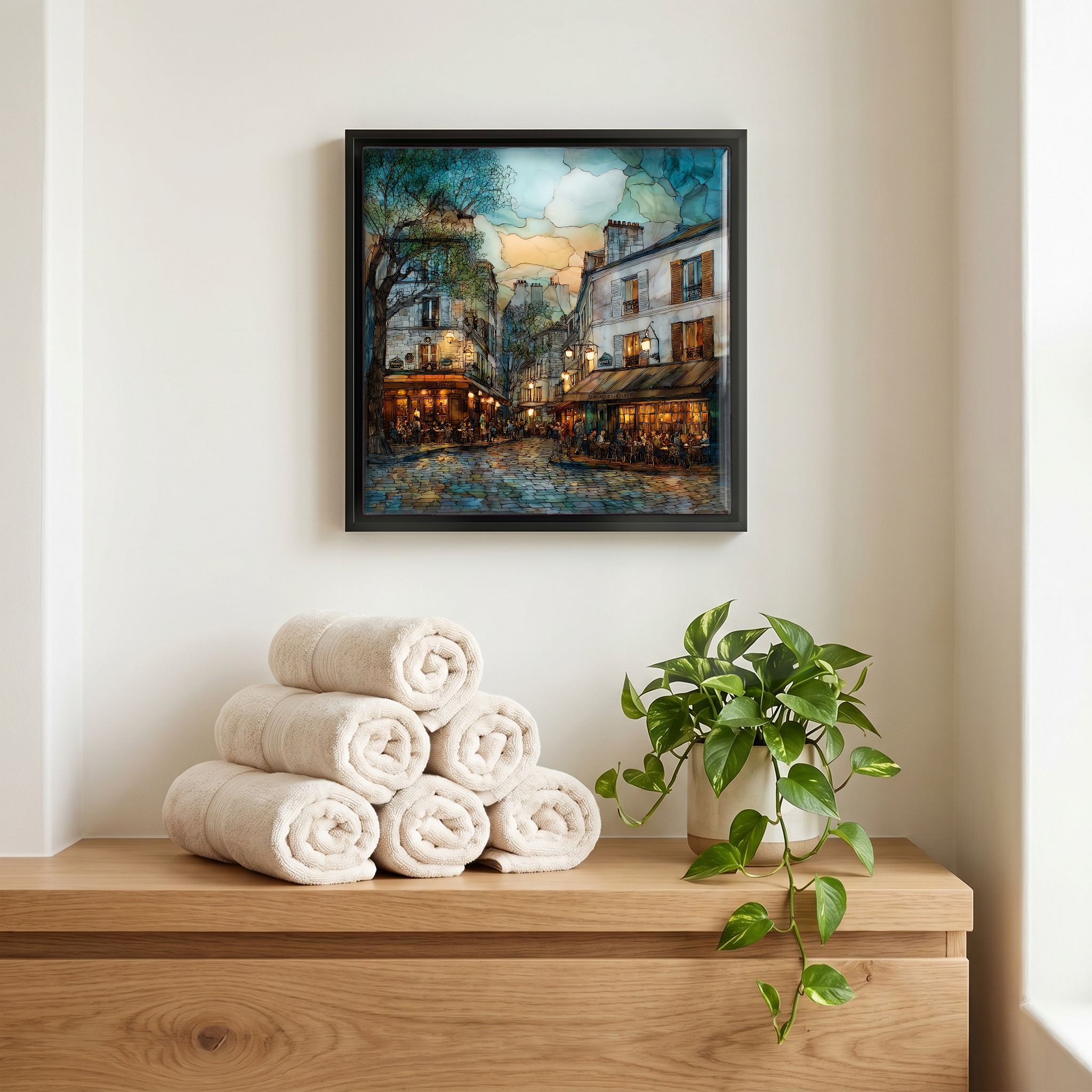 Above the linens, in a slim black surround.