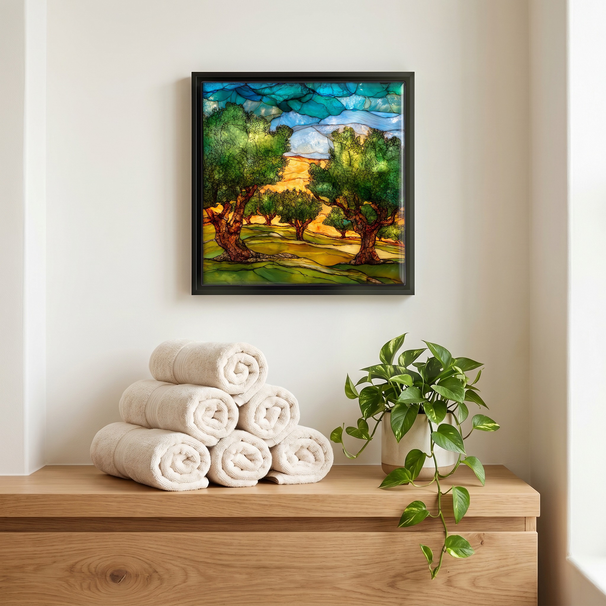 Above the linens, in a slim black surround.