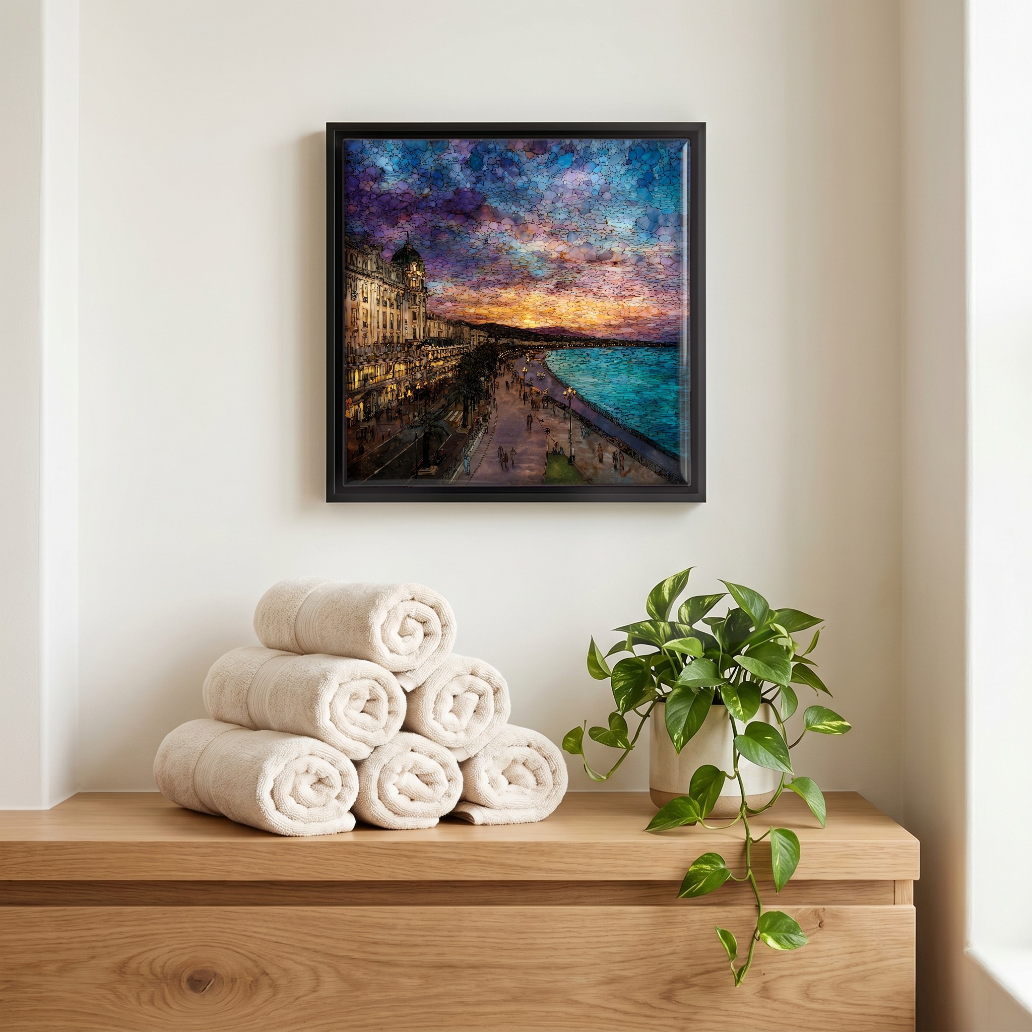 Above the linens, in a slim black surround.