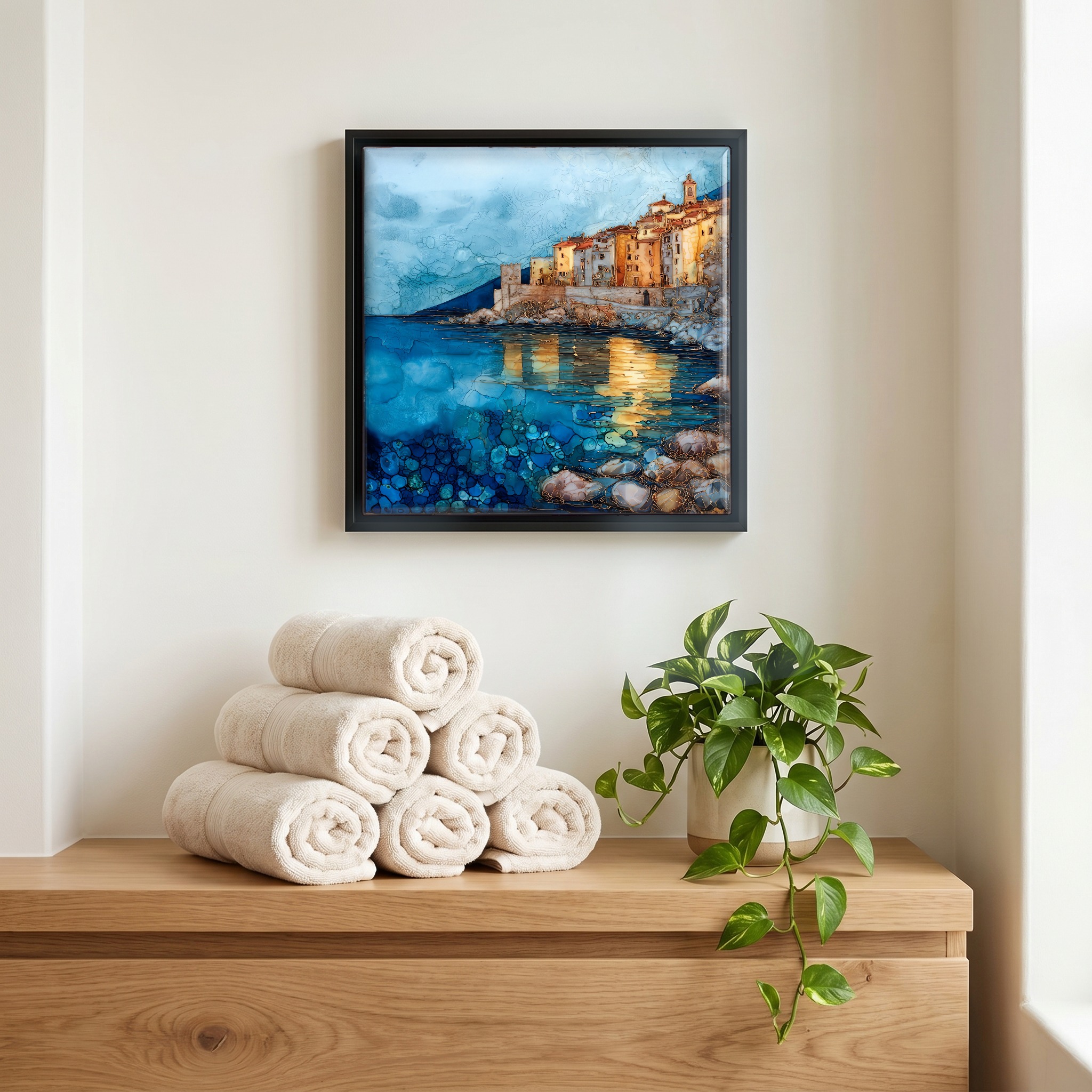Above the linens, in a slim black surround.