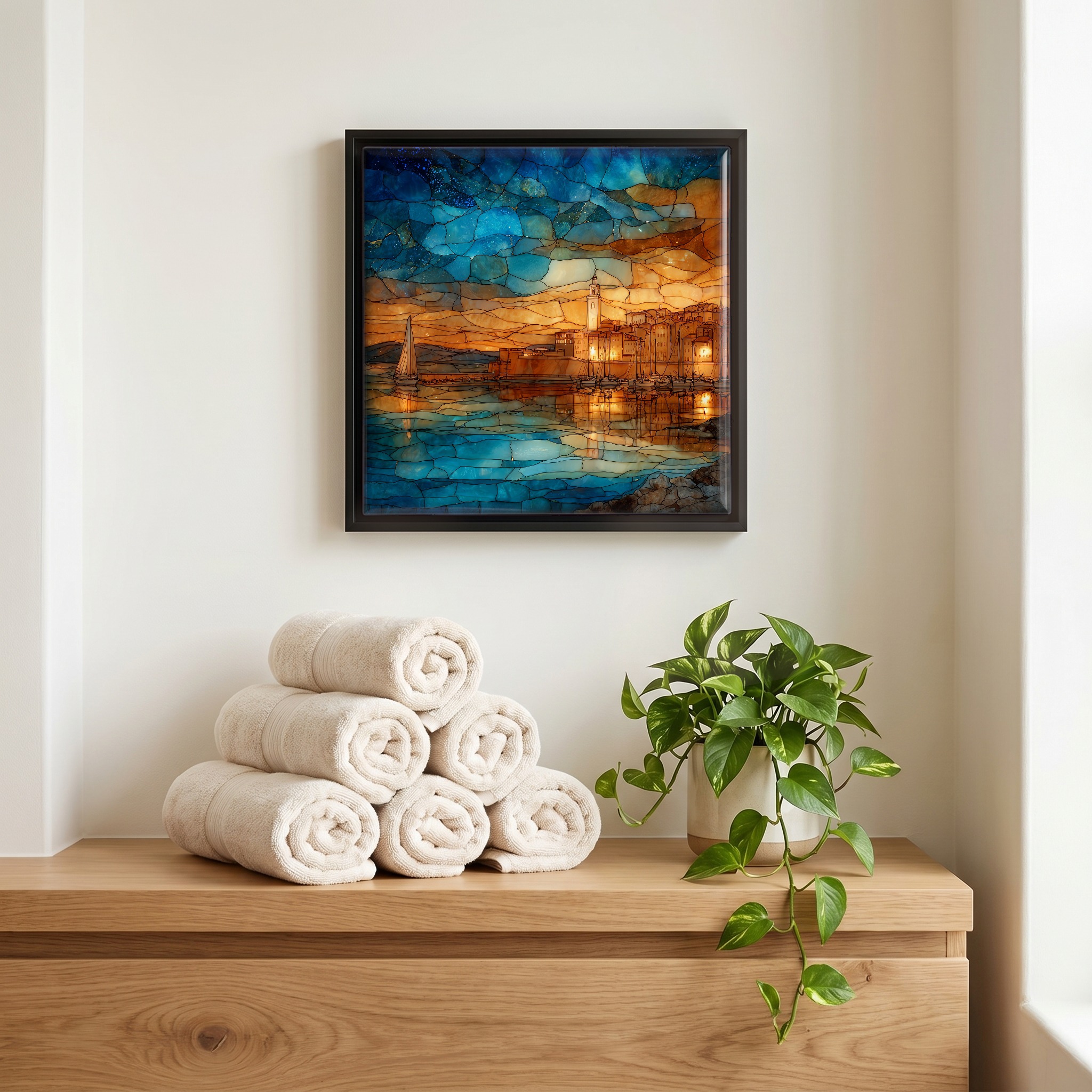 Above the linens, in a slim black surround.