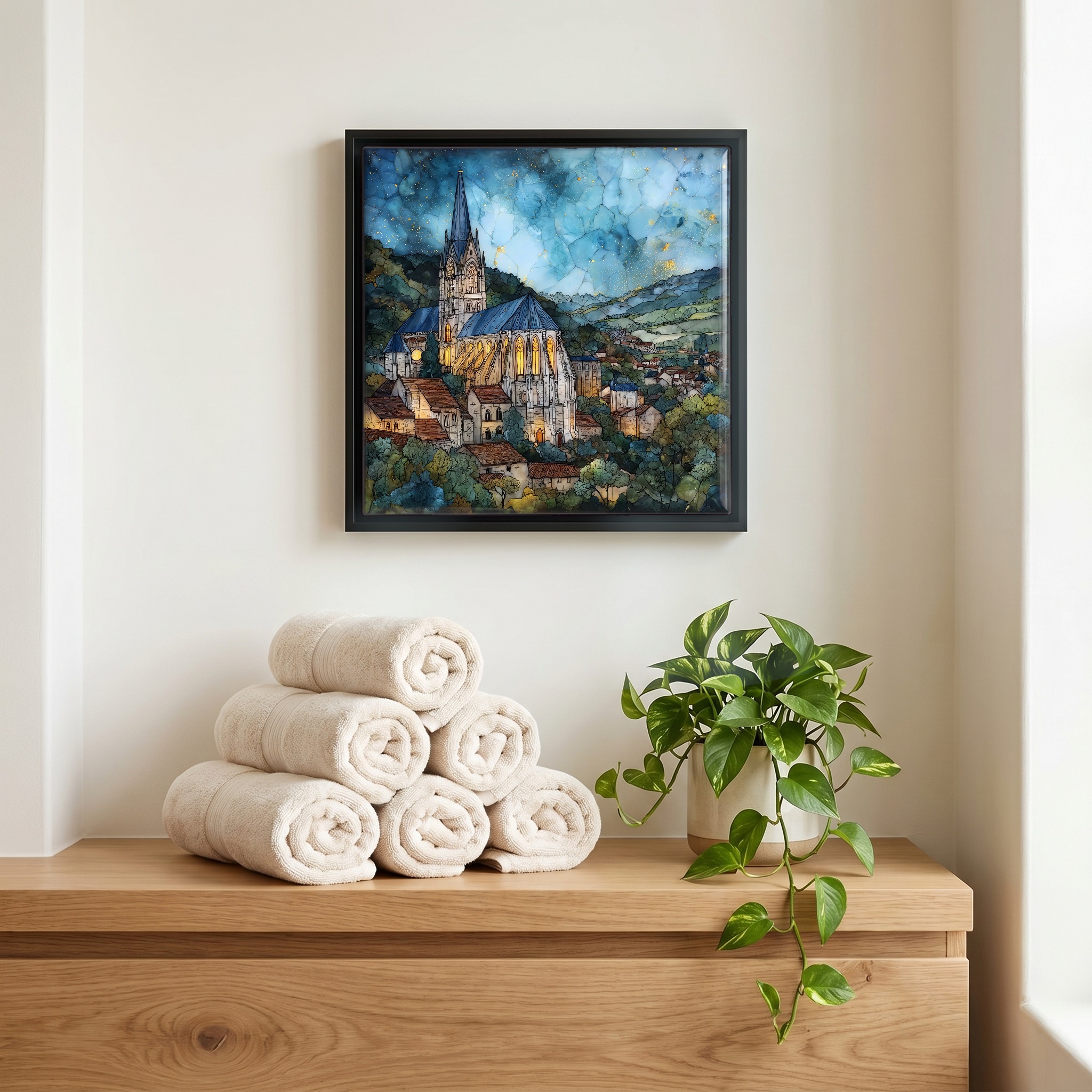 Above the linens, in a slim black surround.