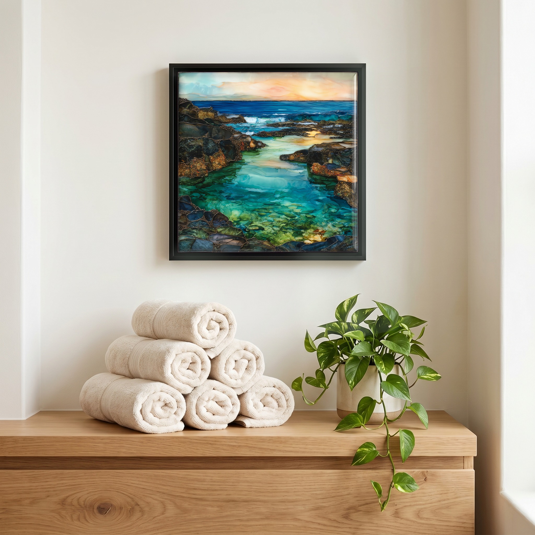 Above the linens, in a slim black surround.