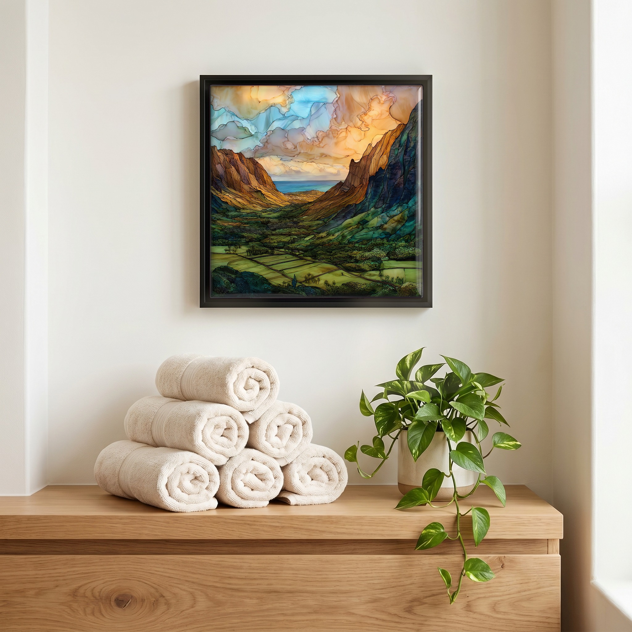 Above the linens, in a slim black surround.