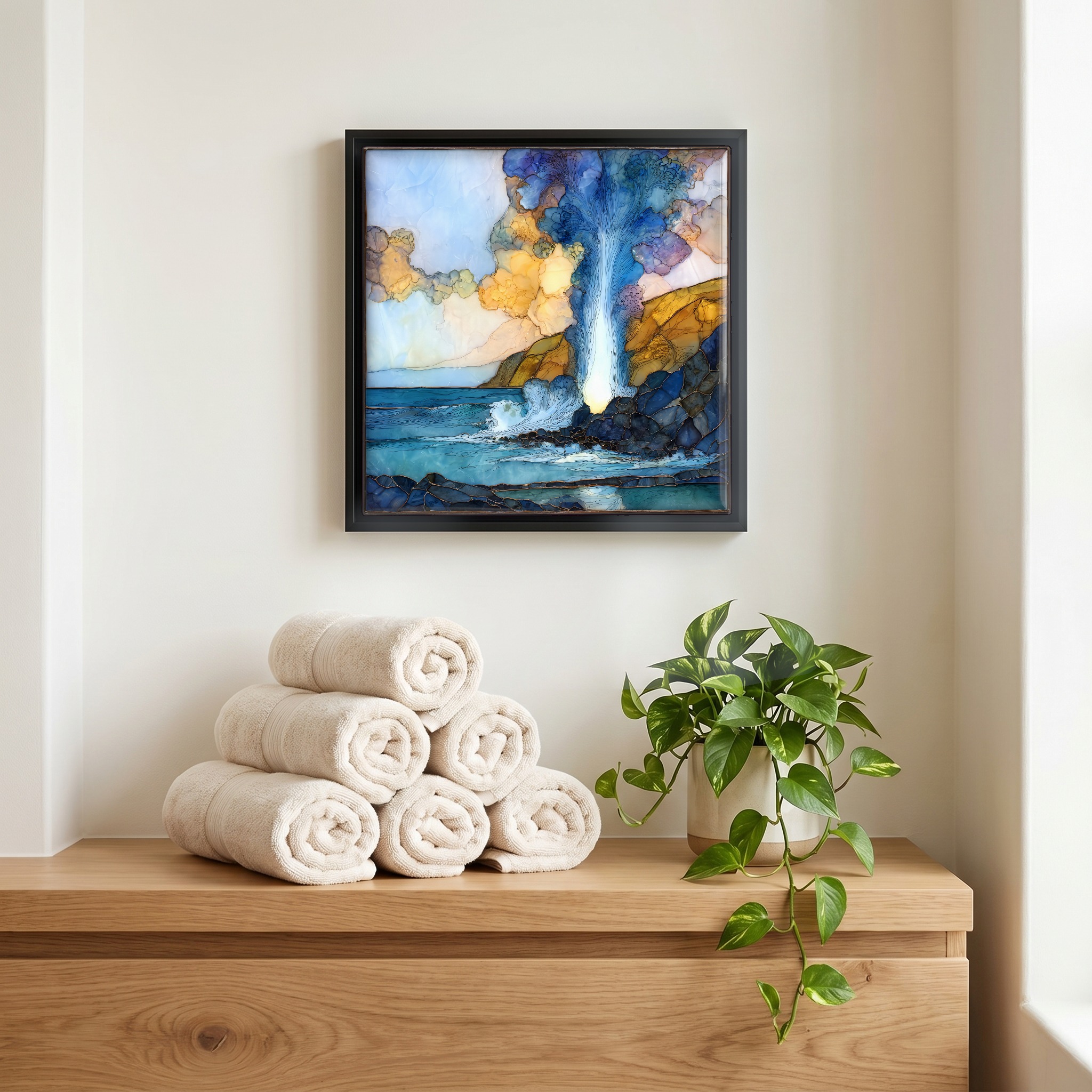 Above the linens, in a slim black surround.