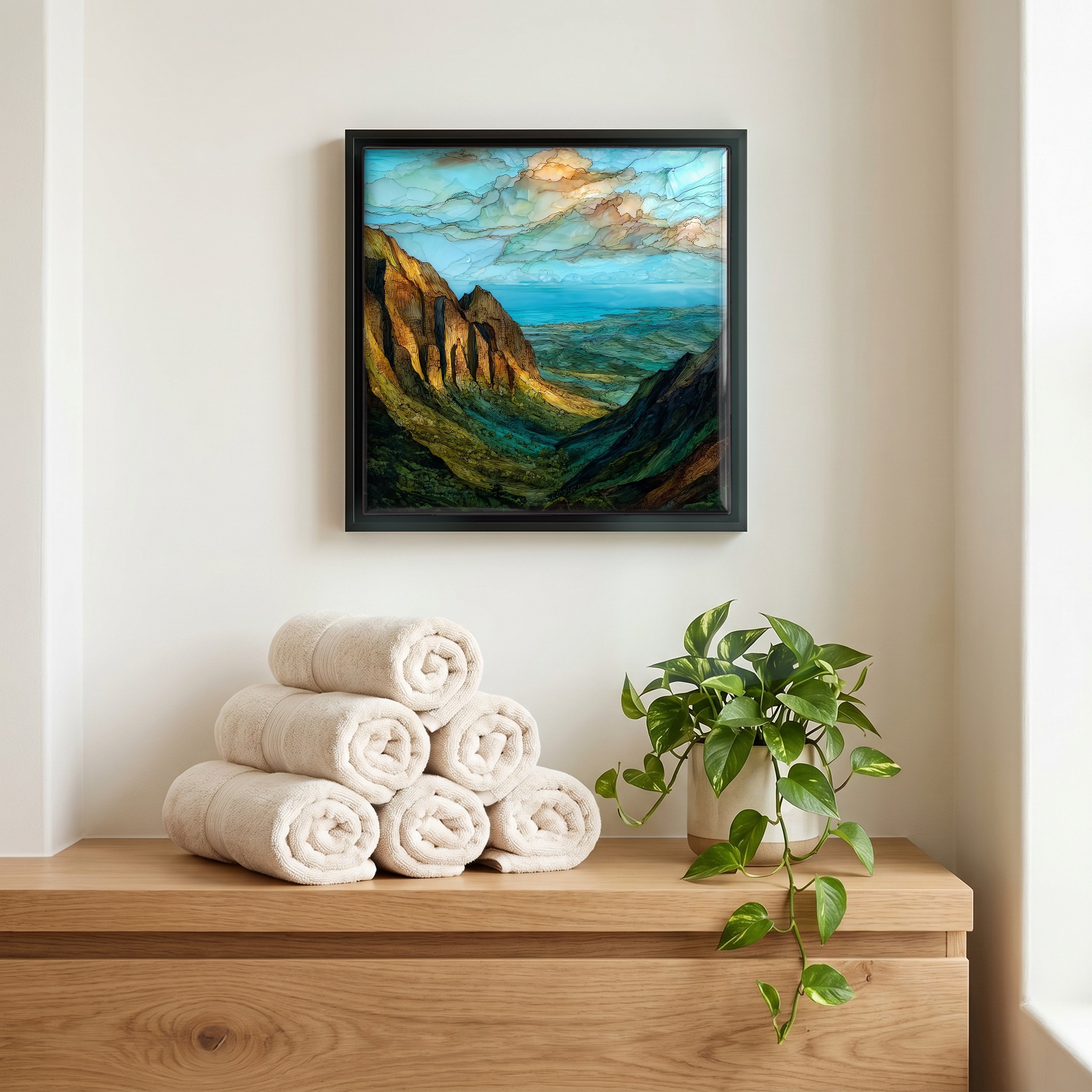 Above the linens, in a slim black surround.