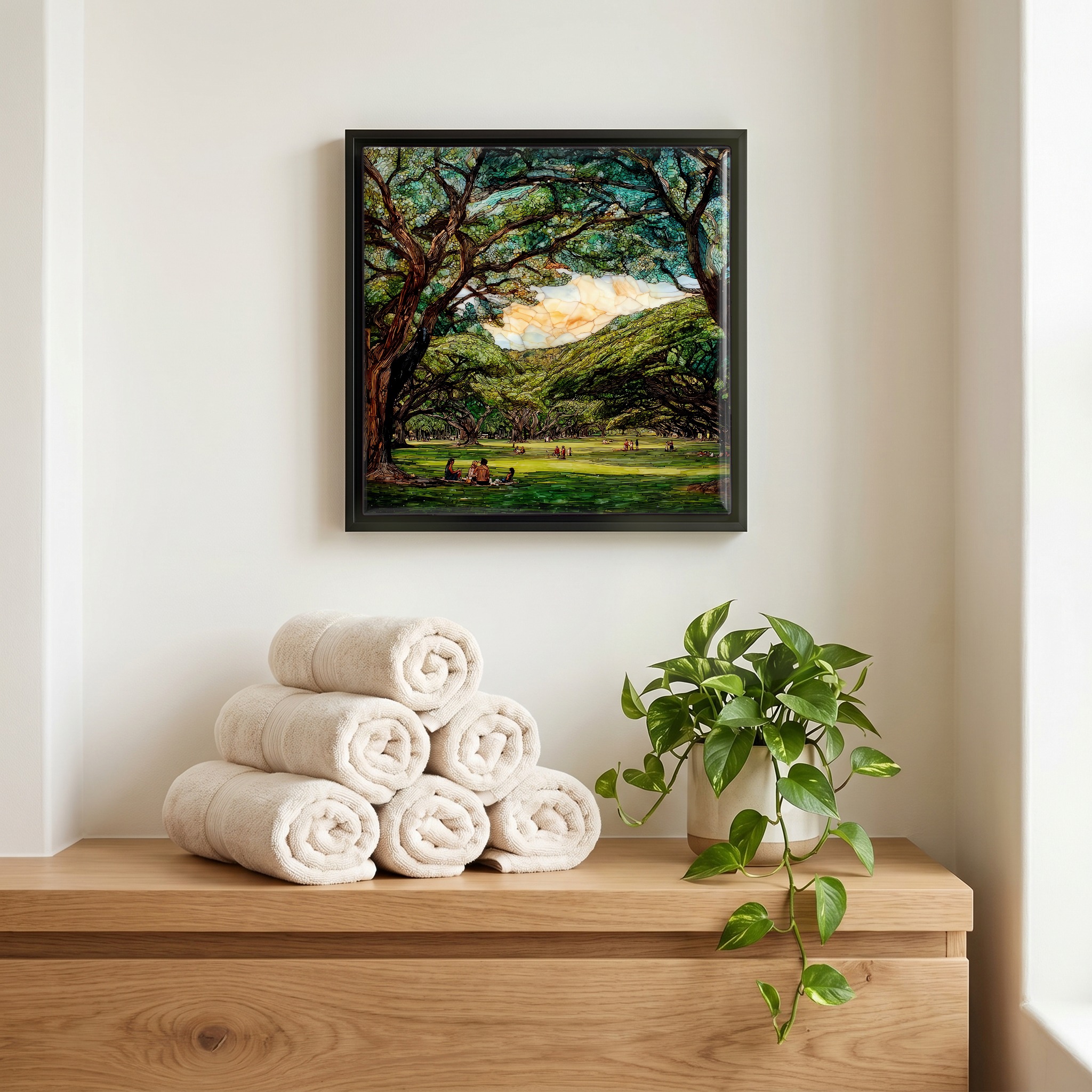 Above the linens, in a slim black surround.