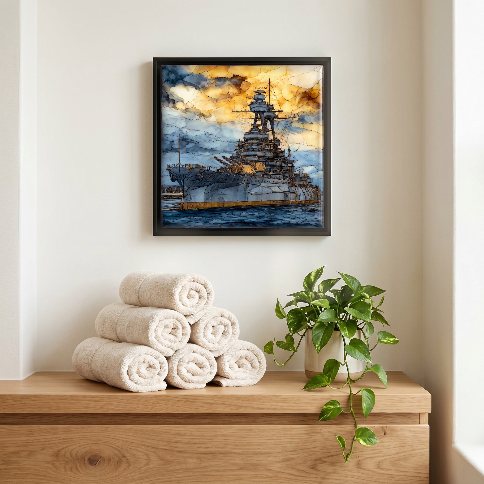 Above the linens, in a slim black surround.