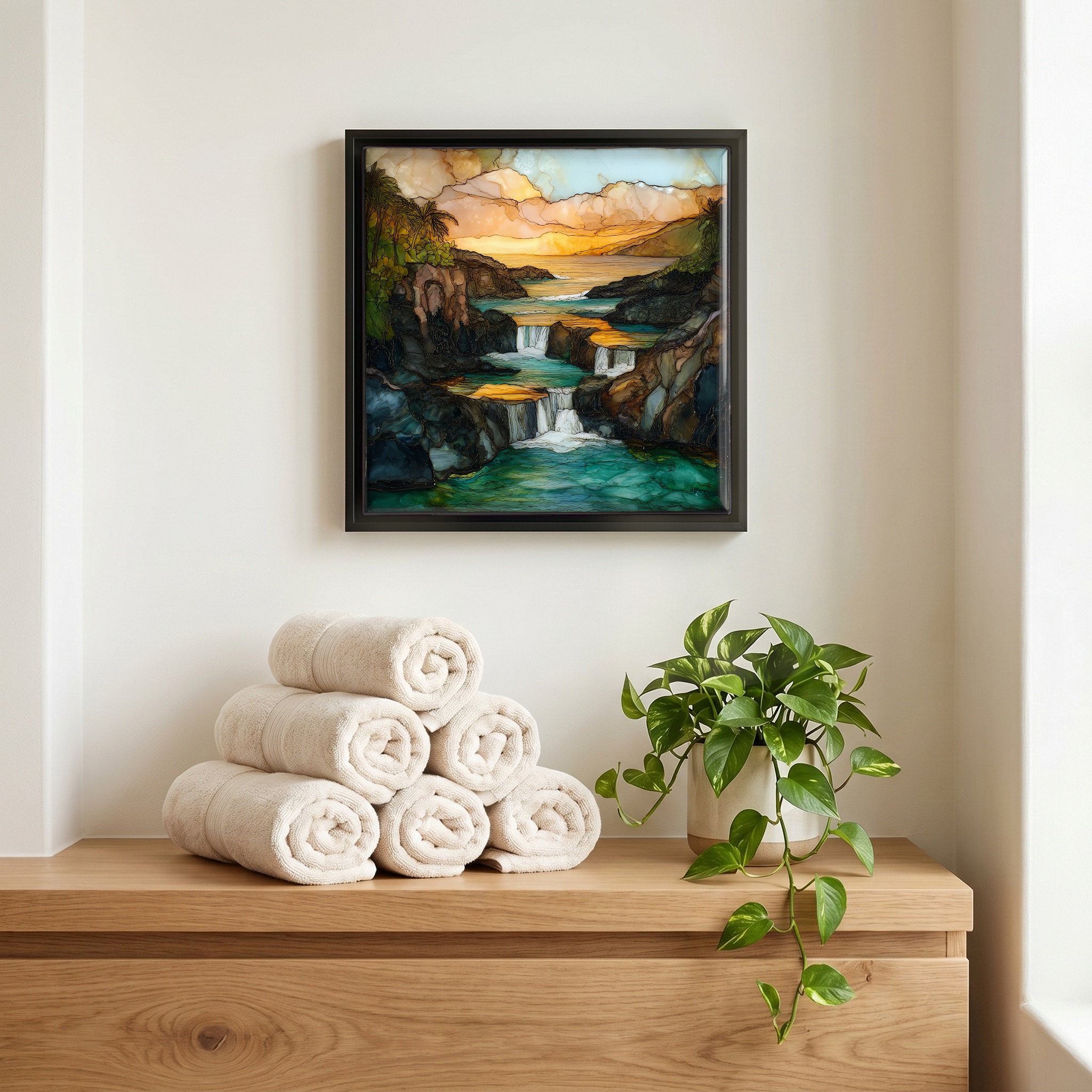 Above the linens, in a slim black surround.