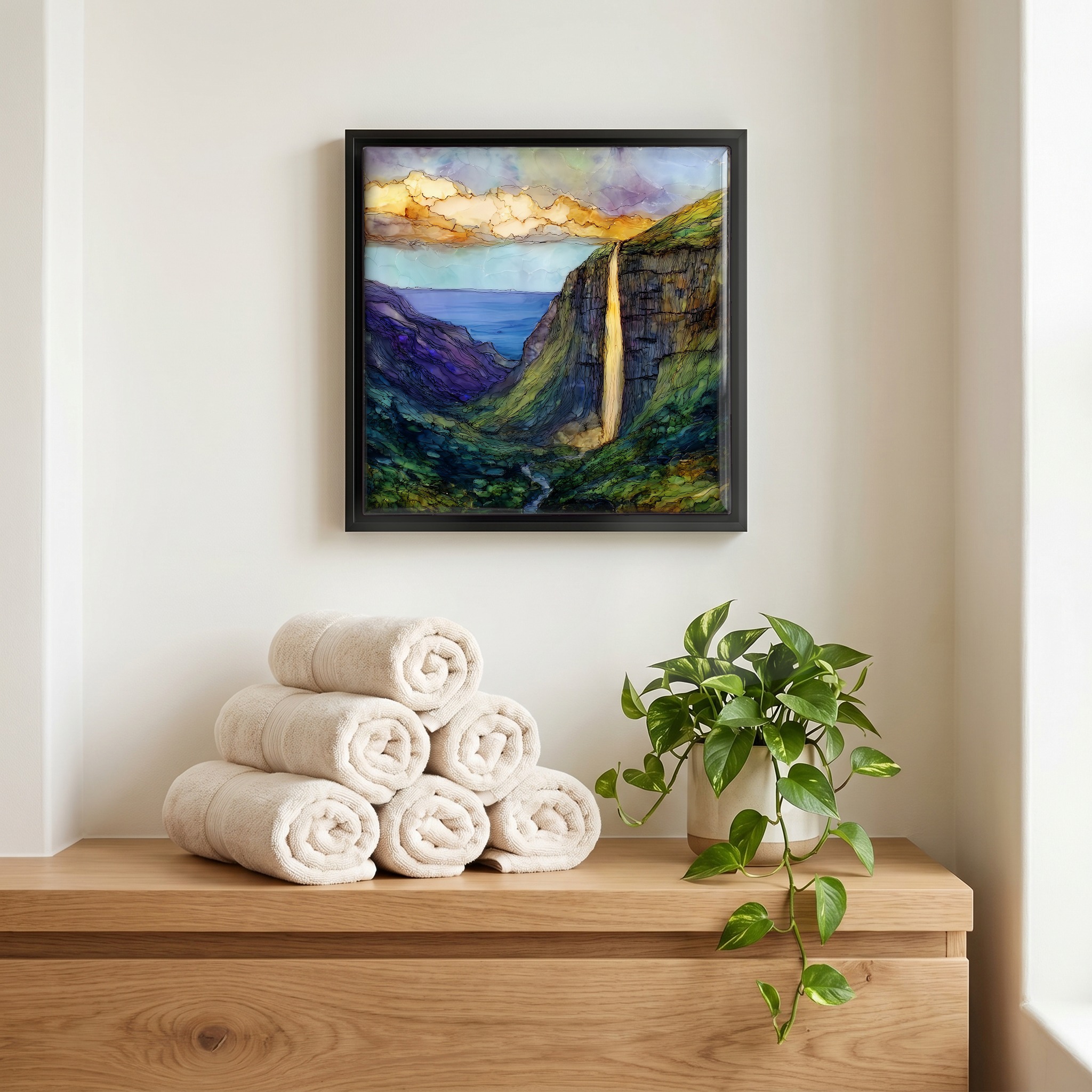 Above the linens, in a slim black surround.