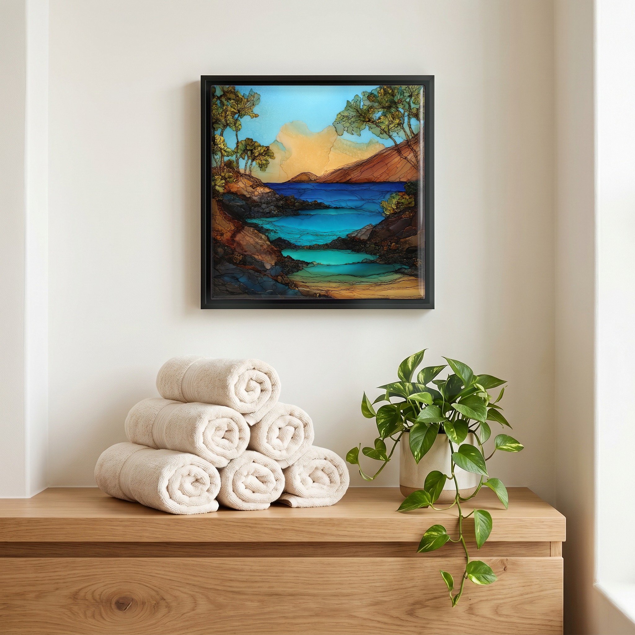 Above the linens, in a slim black surround.
