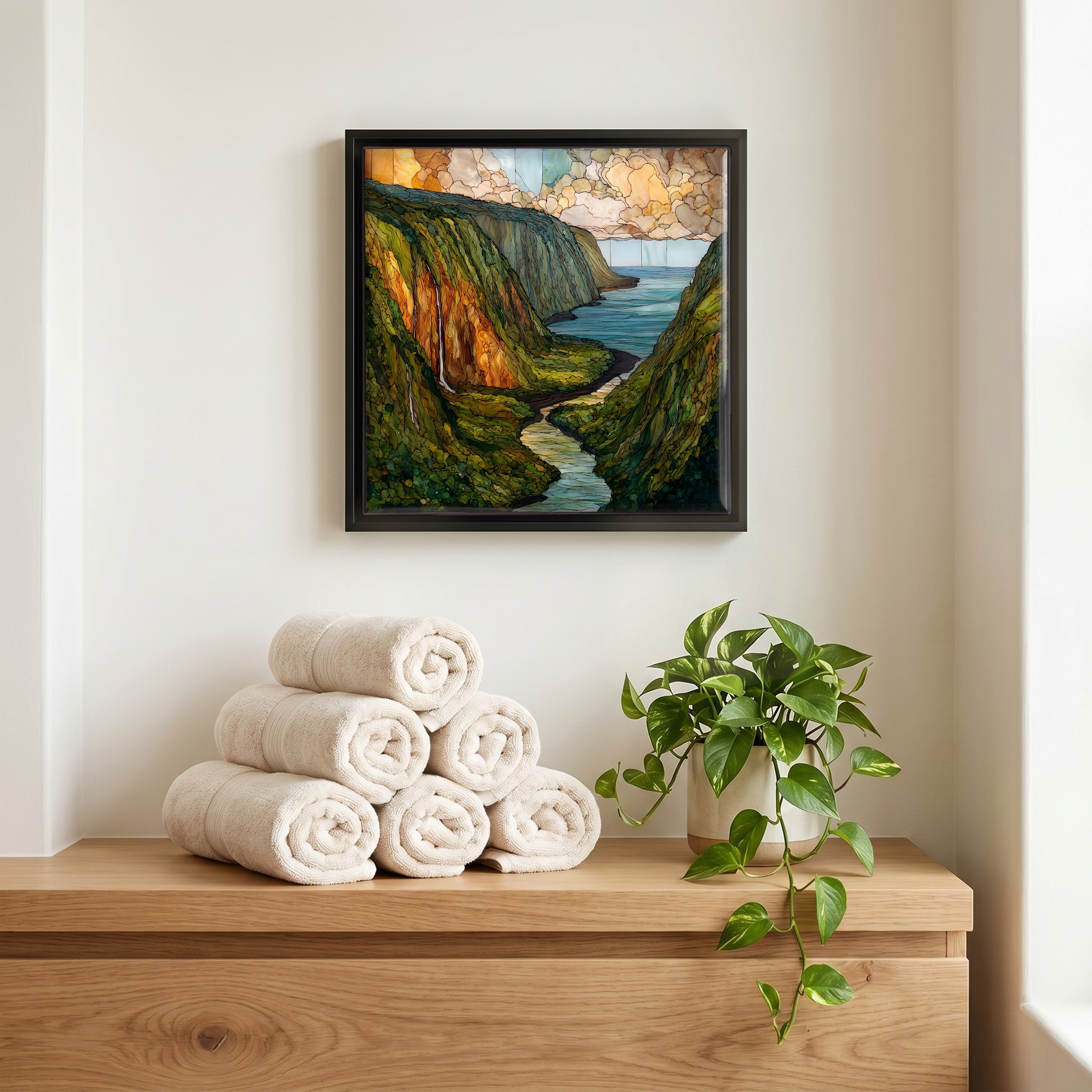 Above the linens, in a slim black surround.