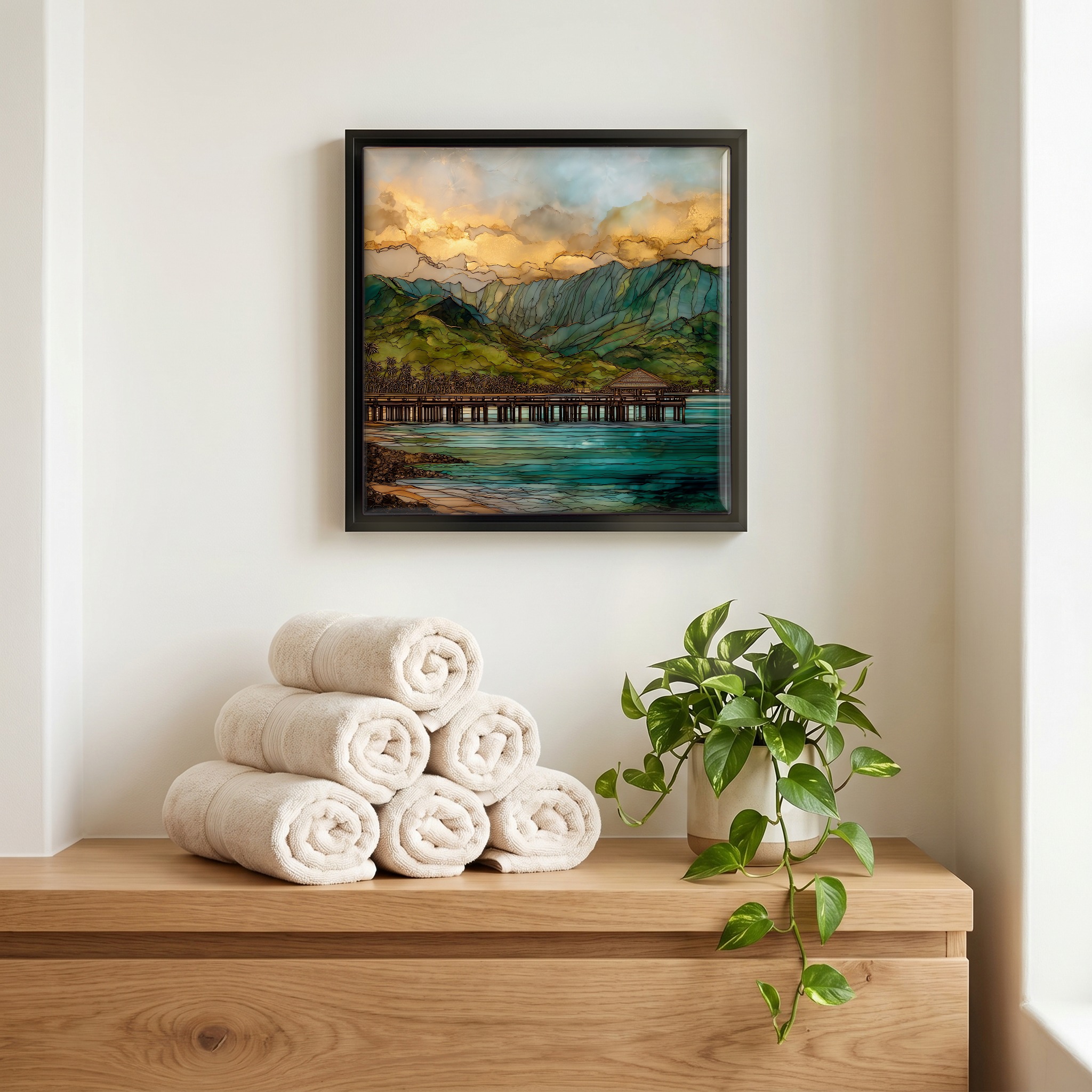 Above the linens, in a slim black surround.
