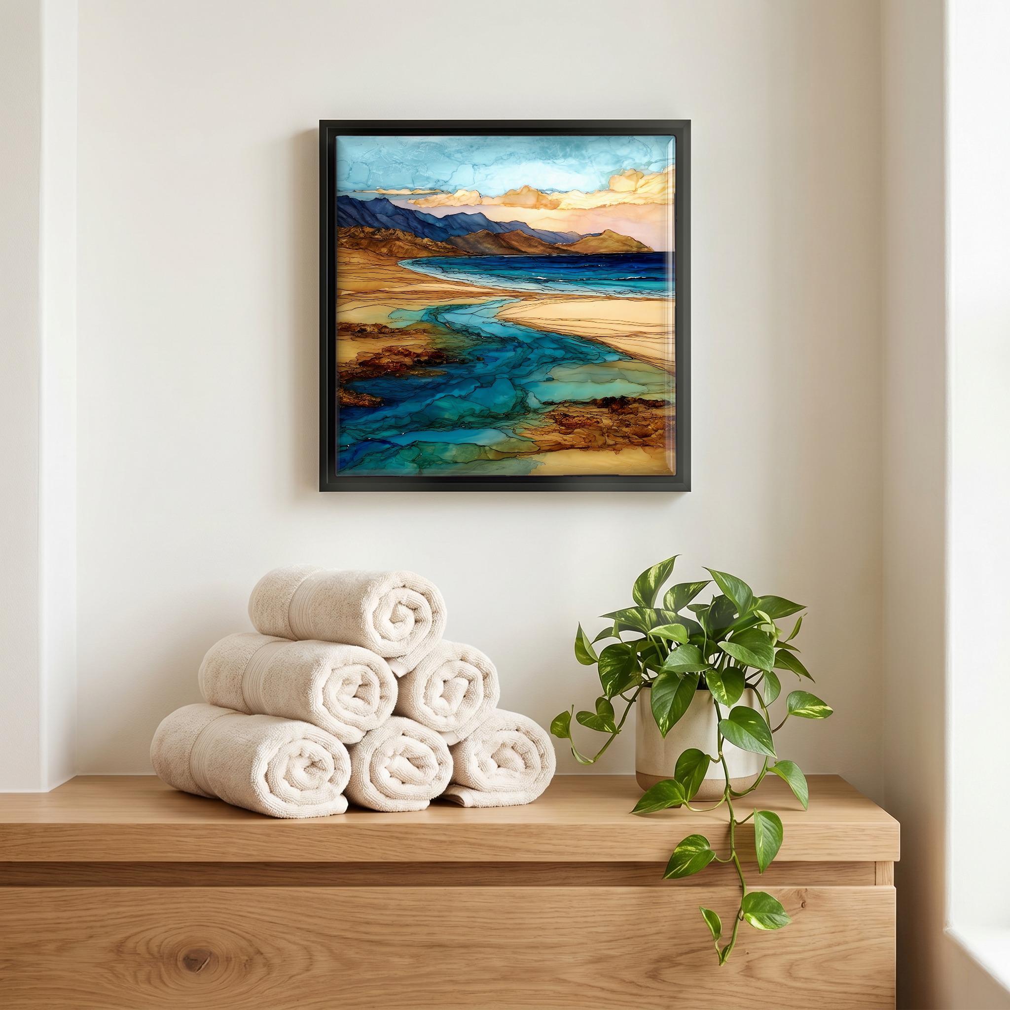 Above the linens, in a slim black surround.