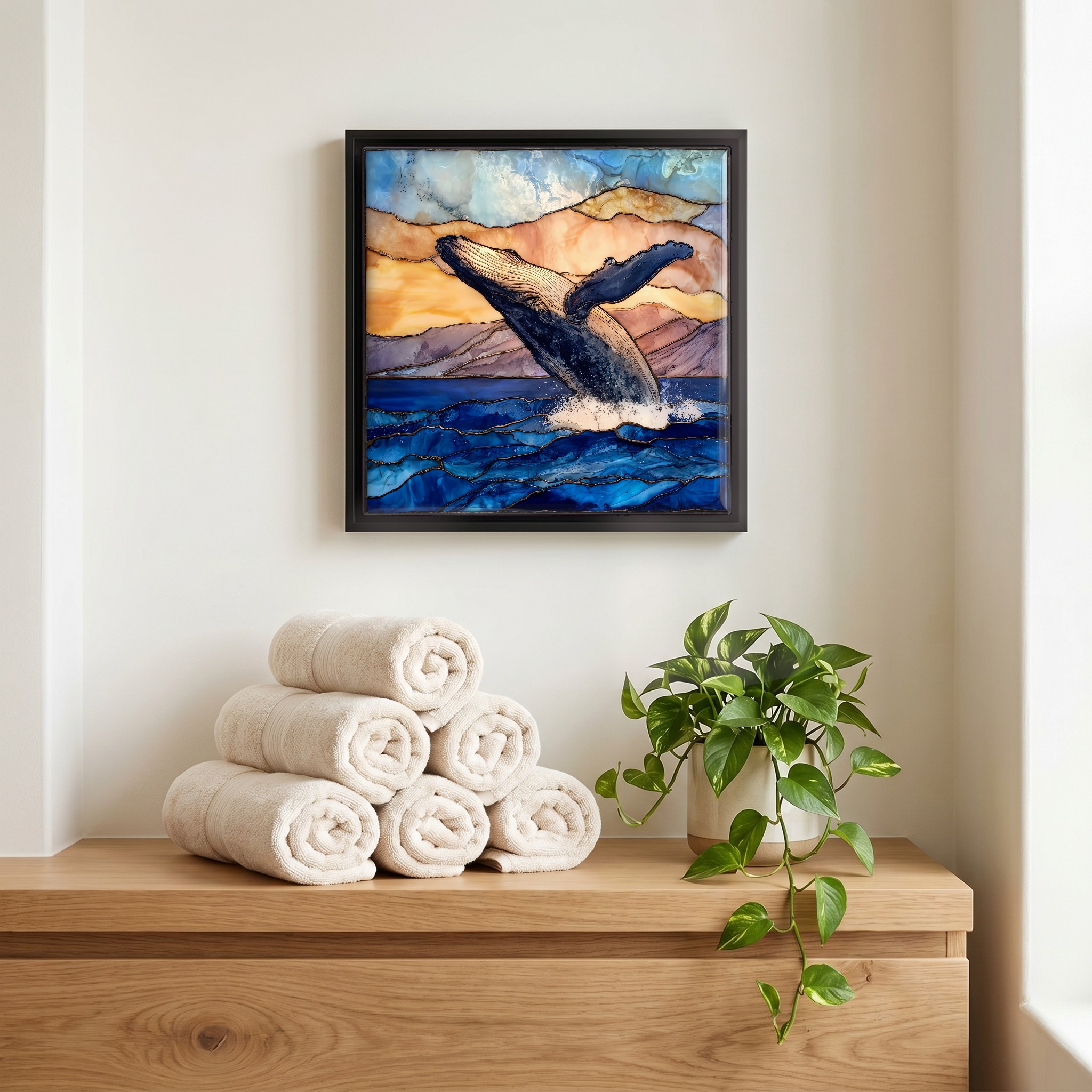 Above the linens, in a slim black surround.