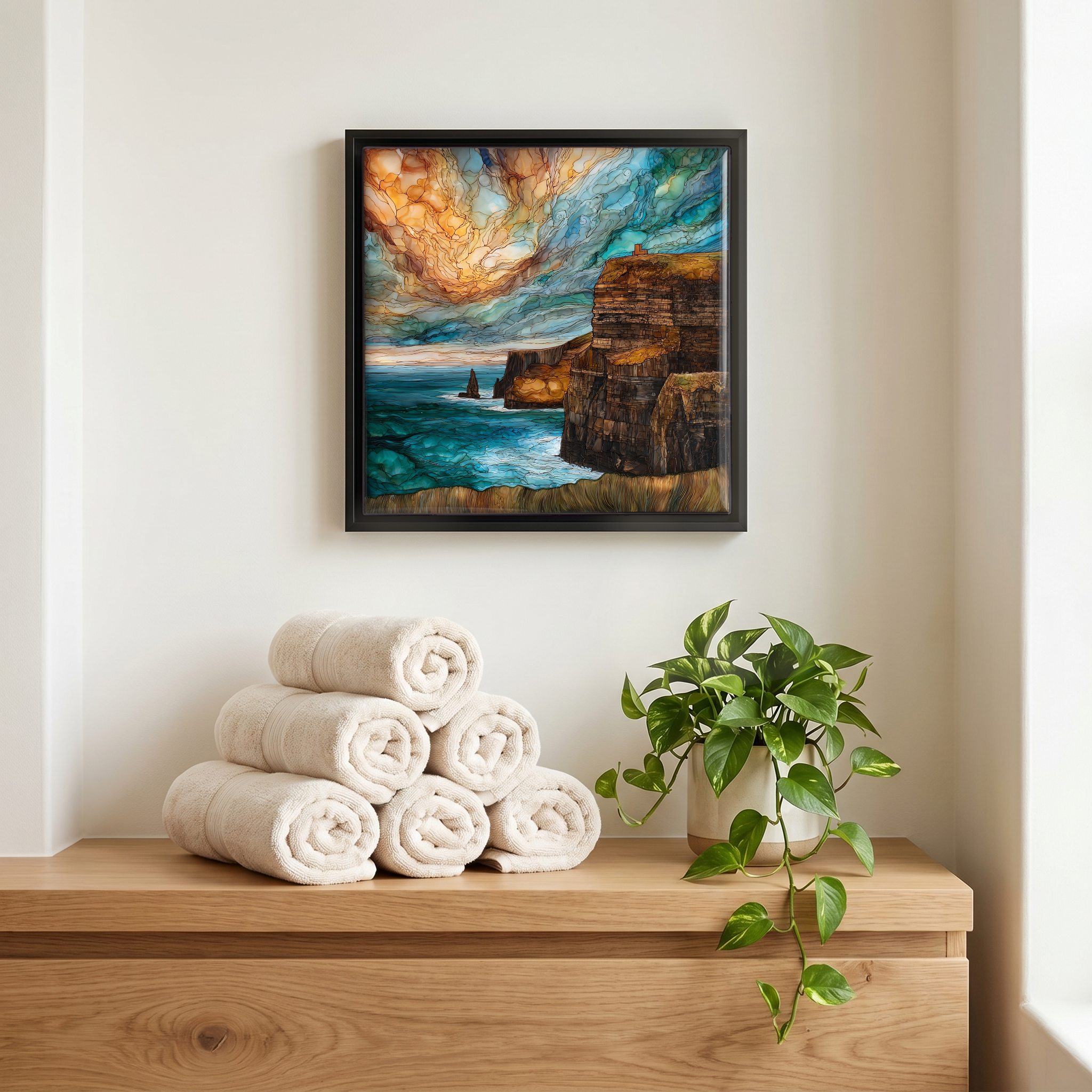 Above the linens, in a slim black surround.