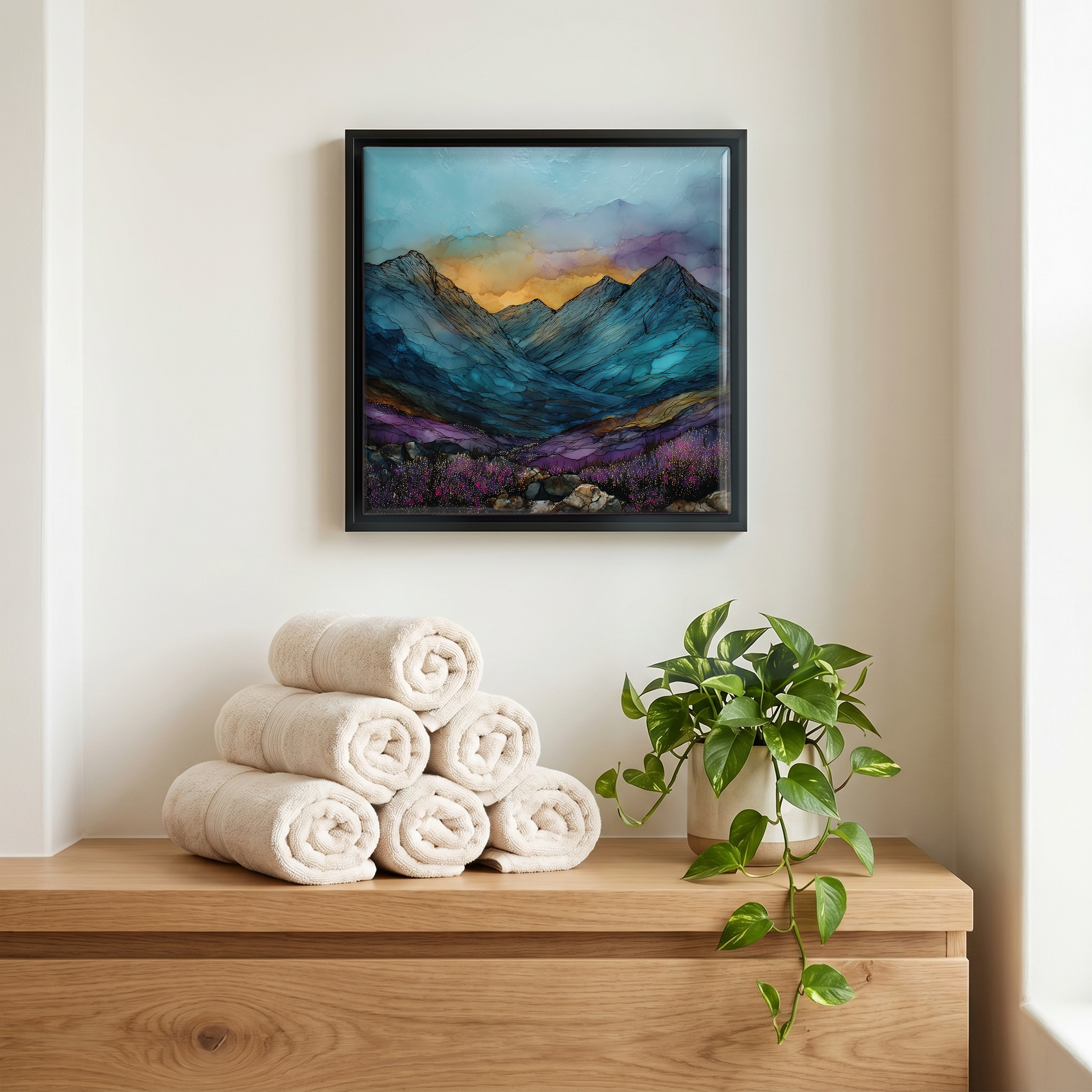 Above the linens, in a slim black surround.