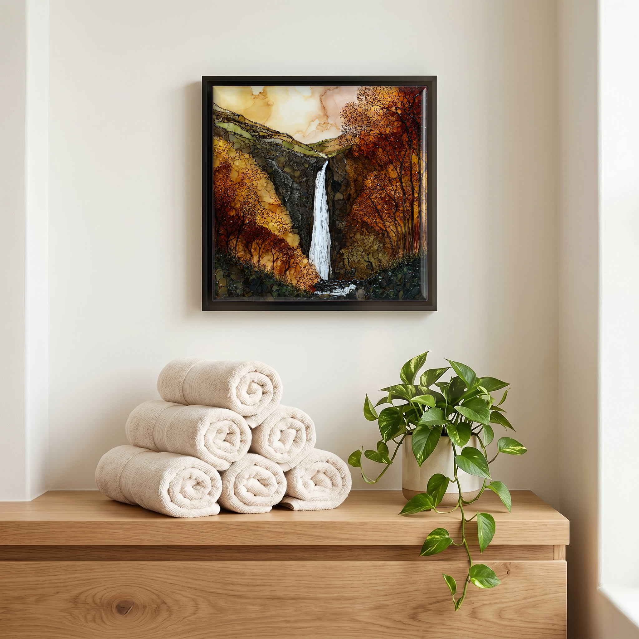 Above the linens, in a slim black surround.