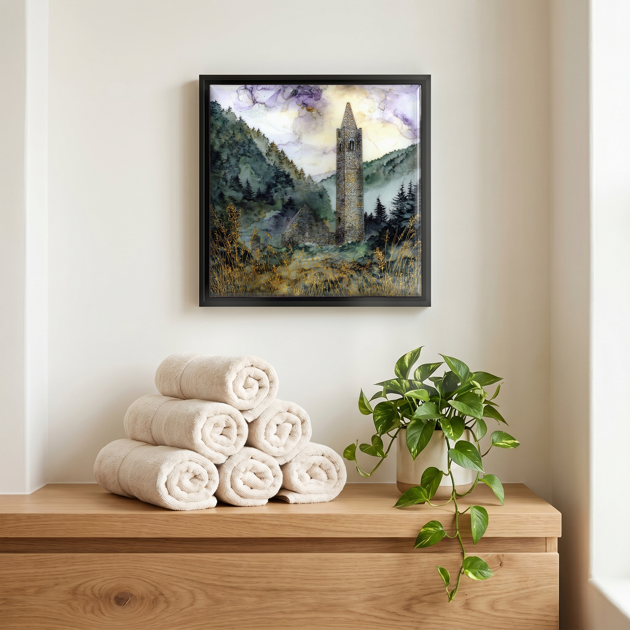 Above the linens, in a slim black surround.