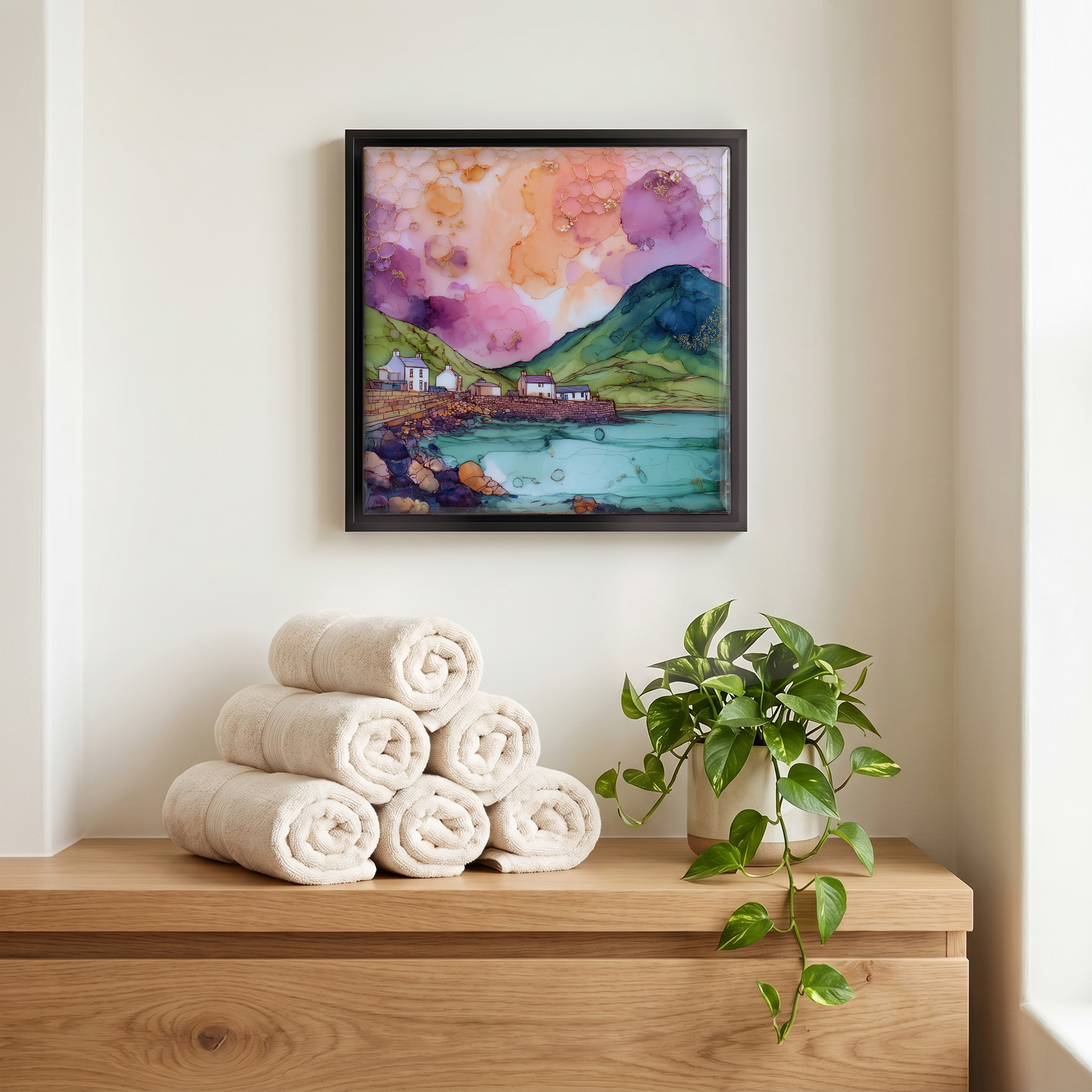 Above the linens, in a slim black surround.