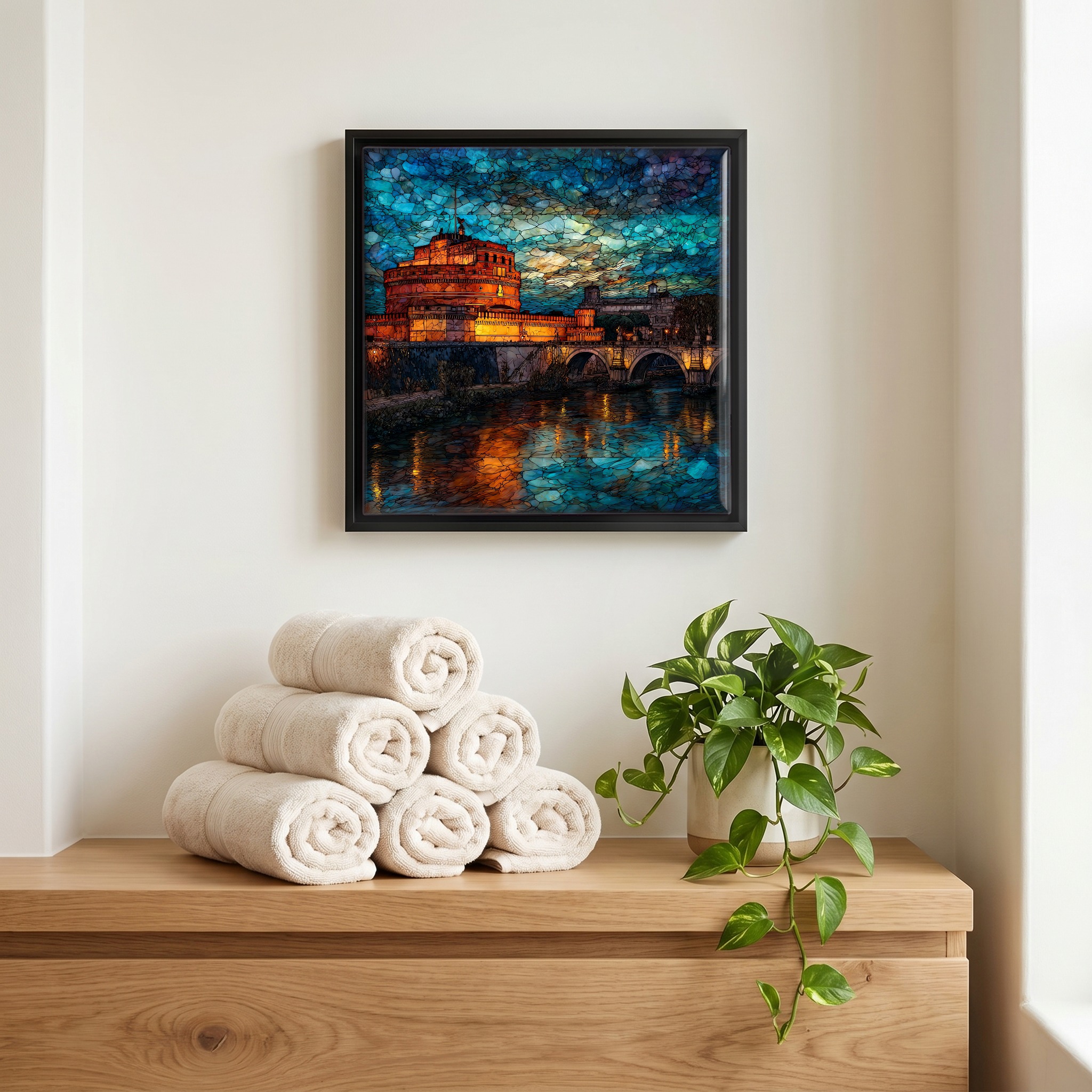 Above the linens, in a slim black surround.